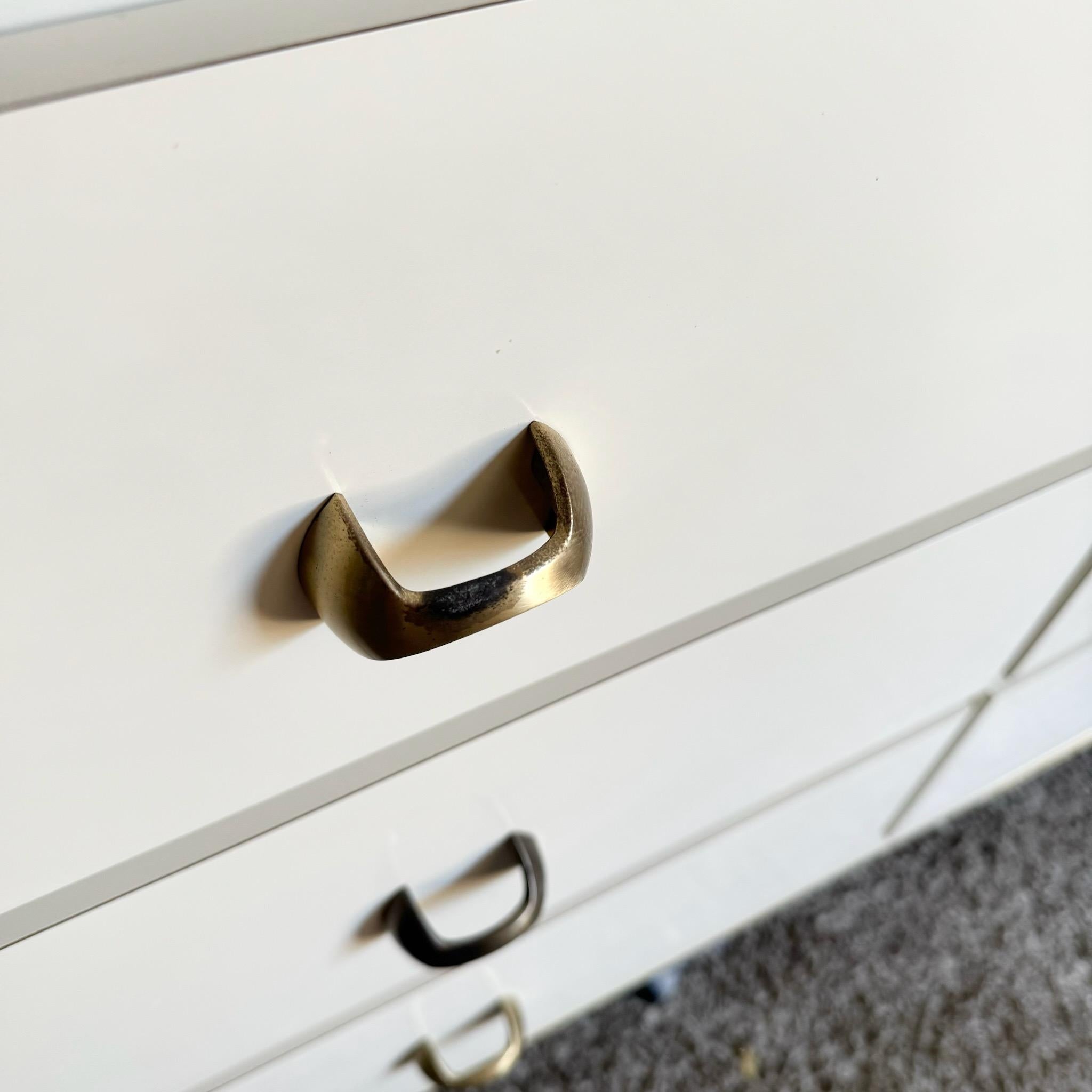 Postmodern Cream Lacquer Laminate Waterfall Dresser With Gold Accents In Good Condition In Delray Beach, FL