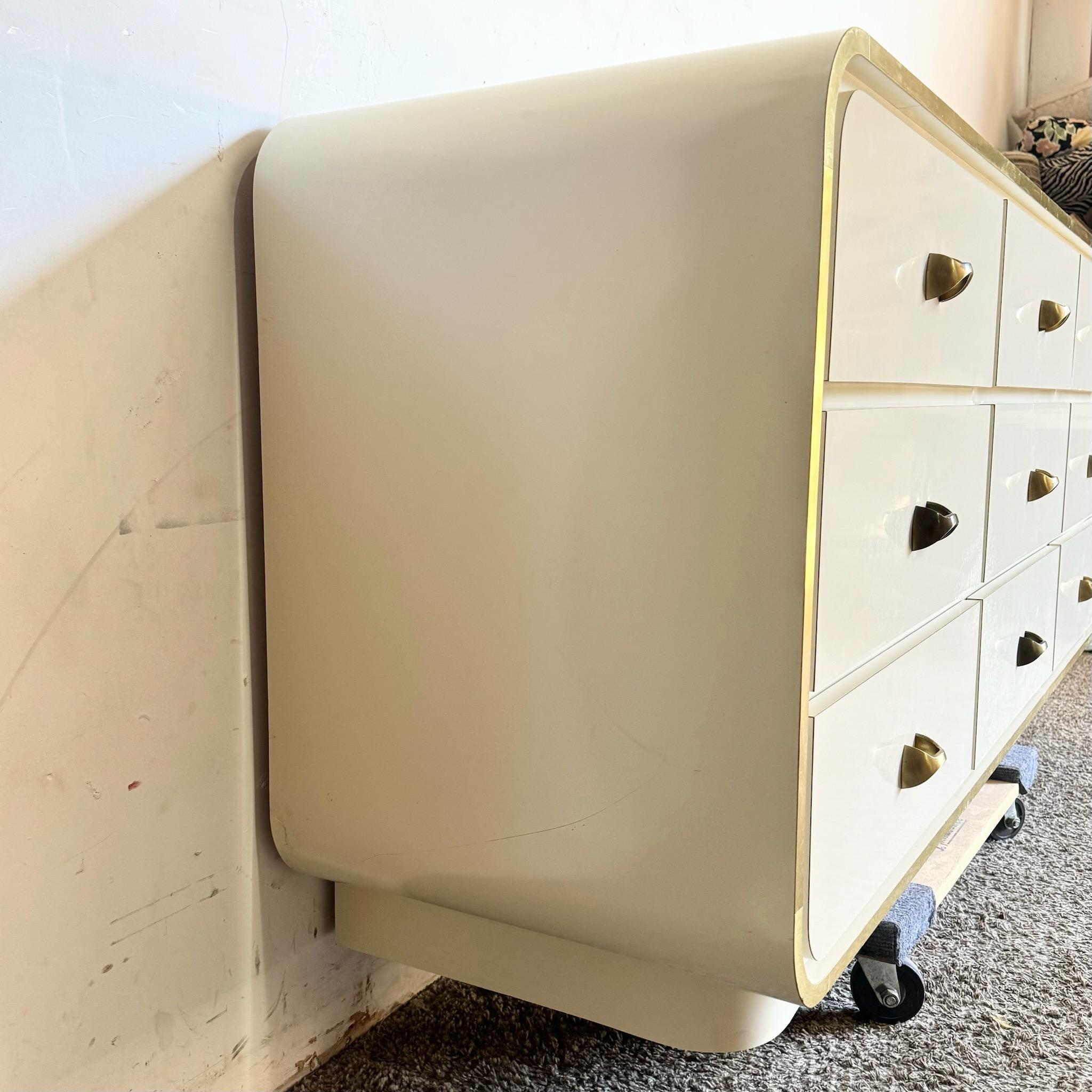 Postmodern Cream Lacquer Laminate Waterfall Dresser With Gold Accents 1