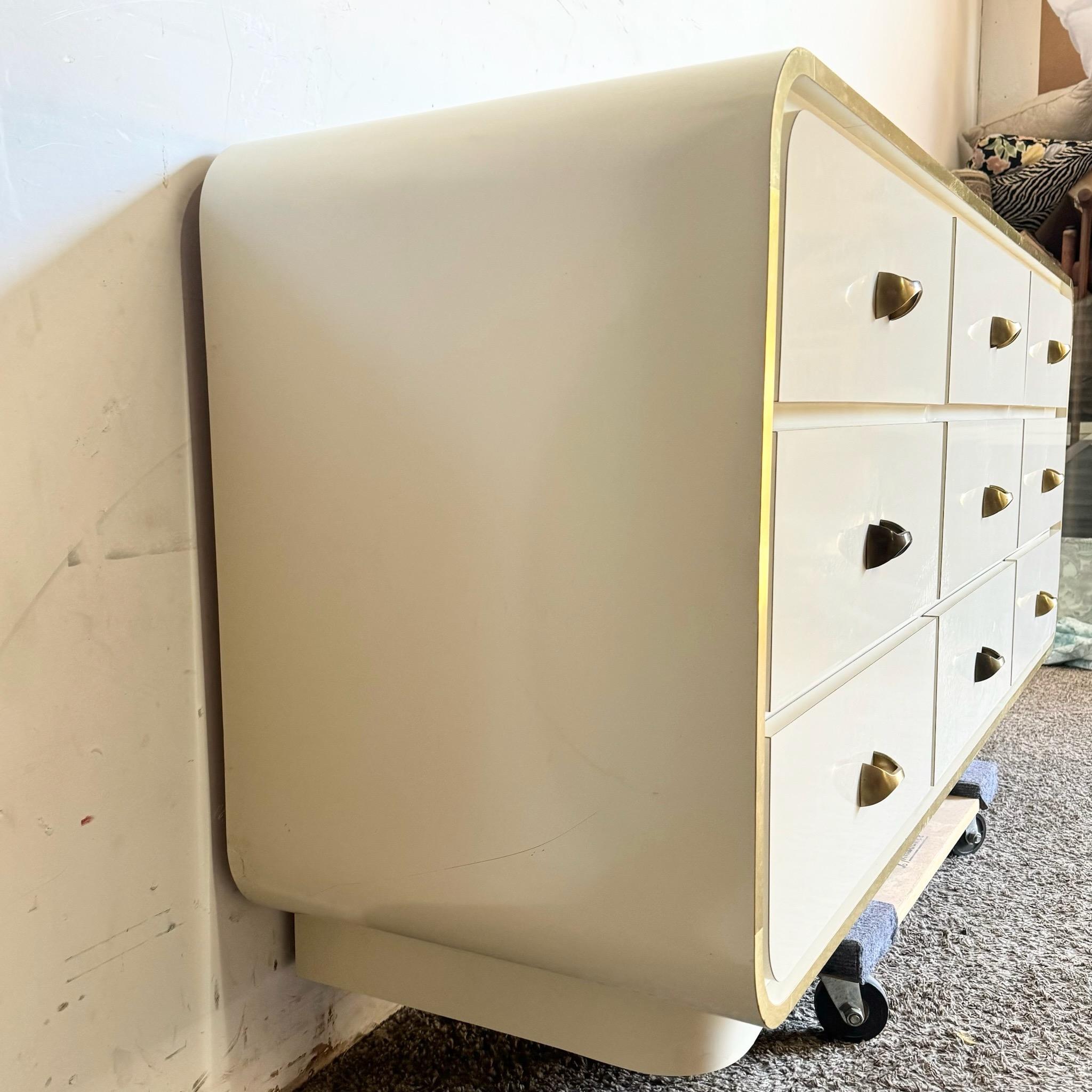 Postmodern Cream Lacquer Laminate Waterfall Dresser With Gold Accents 2