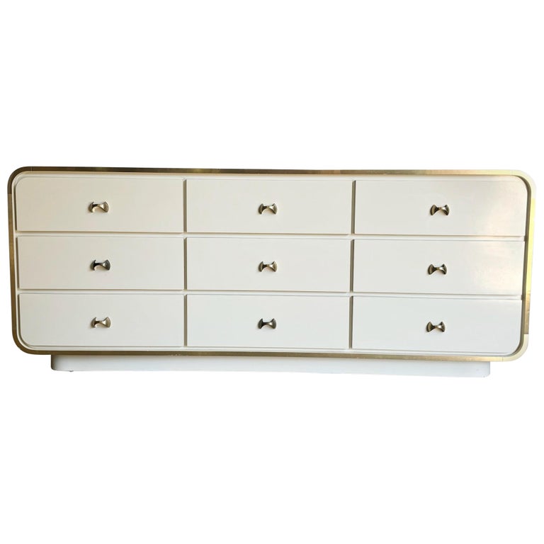 Postmodern Cream Lacquer Laminate Waterfall Dresser With Gold Accents at  1stDibs