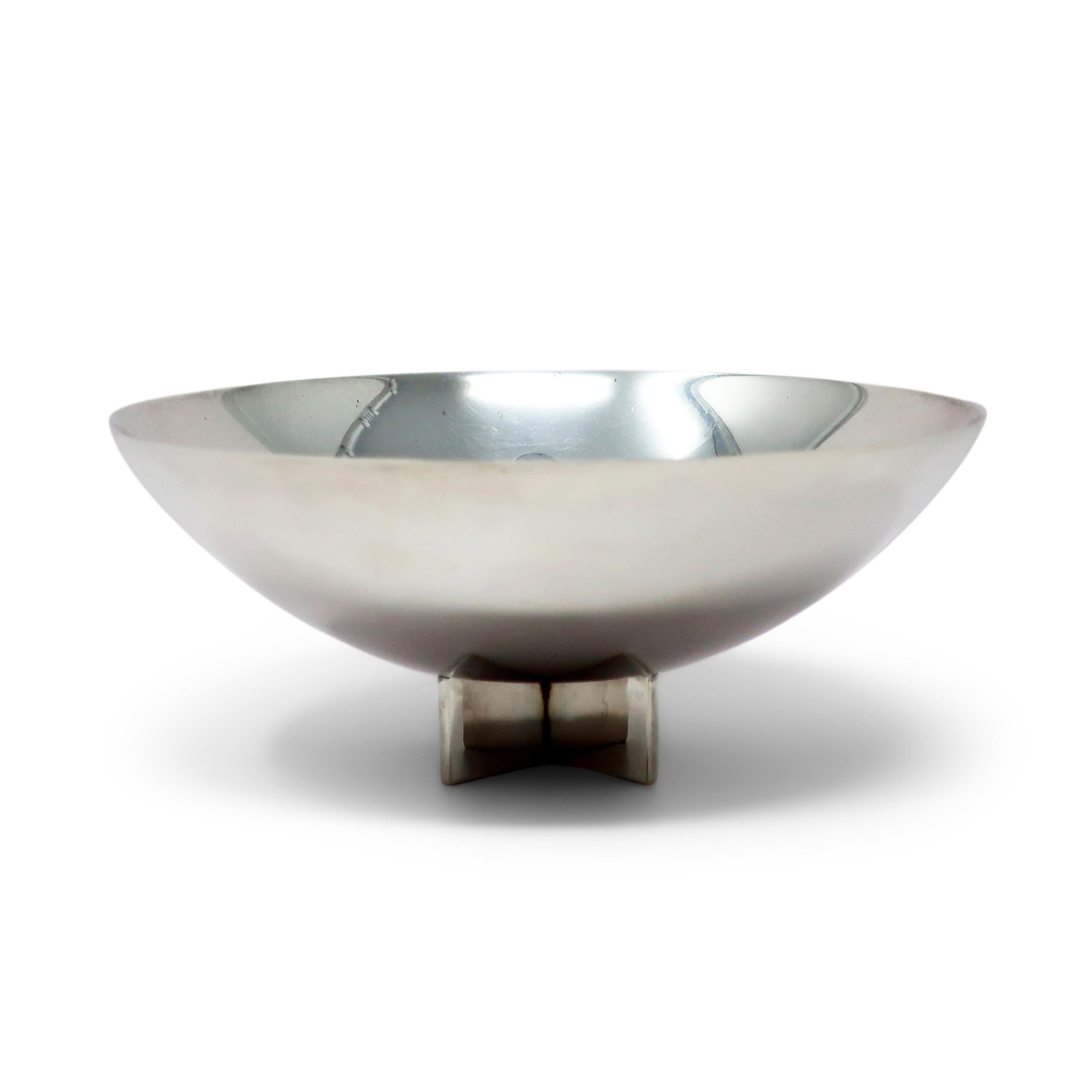 Sometimes referred to as the Cross Bowl and other times as the X-Base Bowl, this postmodern silver-plated bowl is one of Richard Meier’s simplest and most iconic designs for Swid Powell, the American housewares company renowned for collaborating