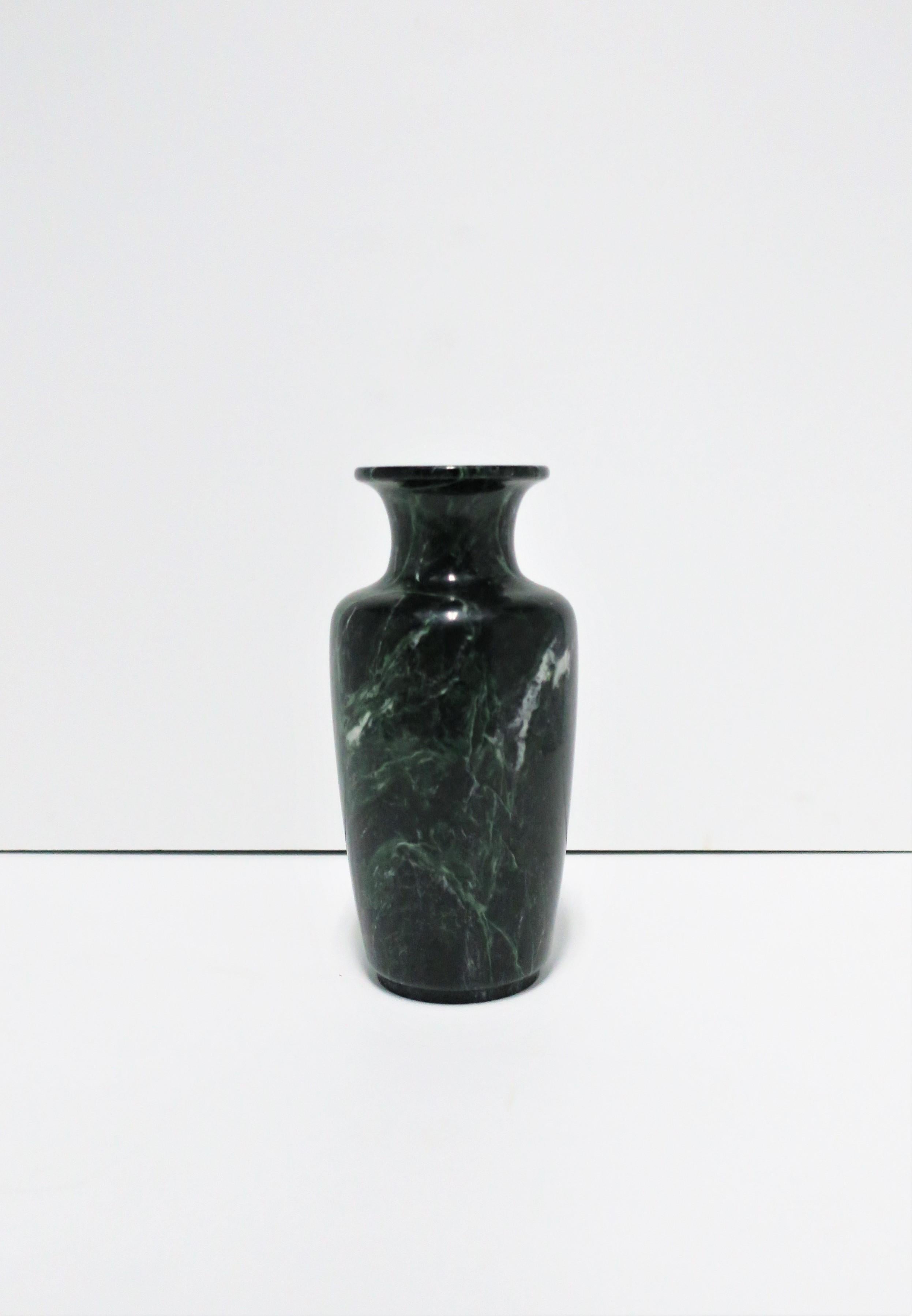 A substantial Postmodern or Modern style urn form dark green and white marble vase, circa 1970s or later, USA. With maker's mark on bottom of vase as show in image #14. Piece measures: 4