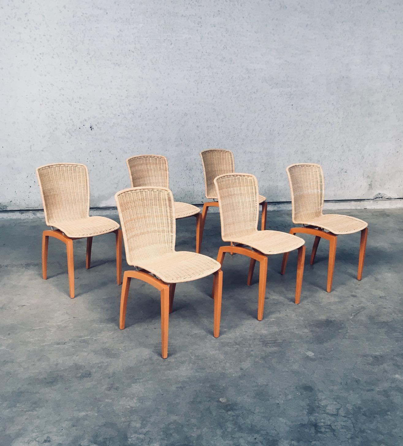 Postmodern Design LIBRA model Dining Chair set of 6 by Christian Werner for Ligne Roset. Made in France, 1995. Marked on each chair with Ligne Roset Label. Beech wood base with woven cane seat and back jointed with aluminium supports between the