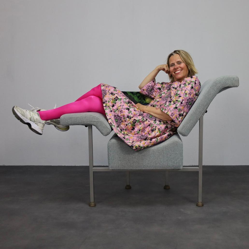 This iconic lounge chair by Rob Eckhardt, titled Groeten uit Holland, is a striking example of Dutch postmodern design. This rare version features a stainless steel frame, enhancing the graphic lines and lending the piece an industrial, timeless