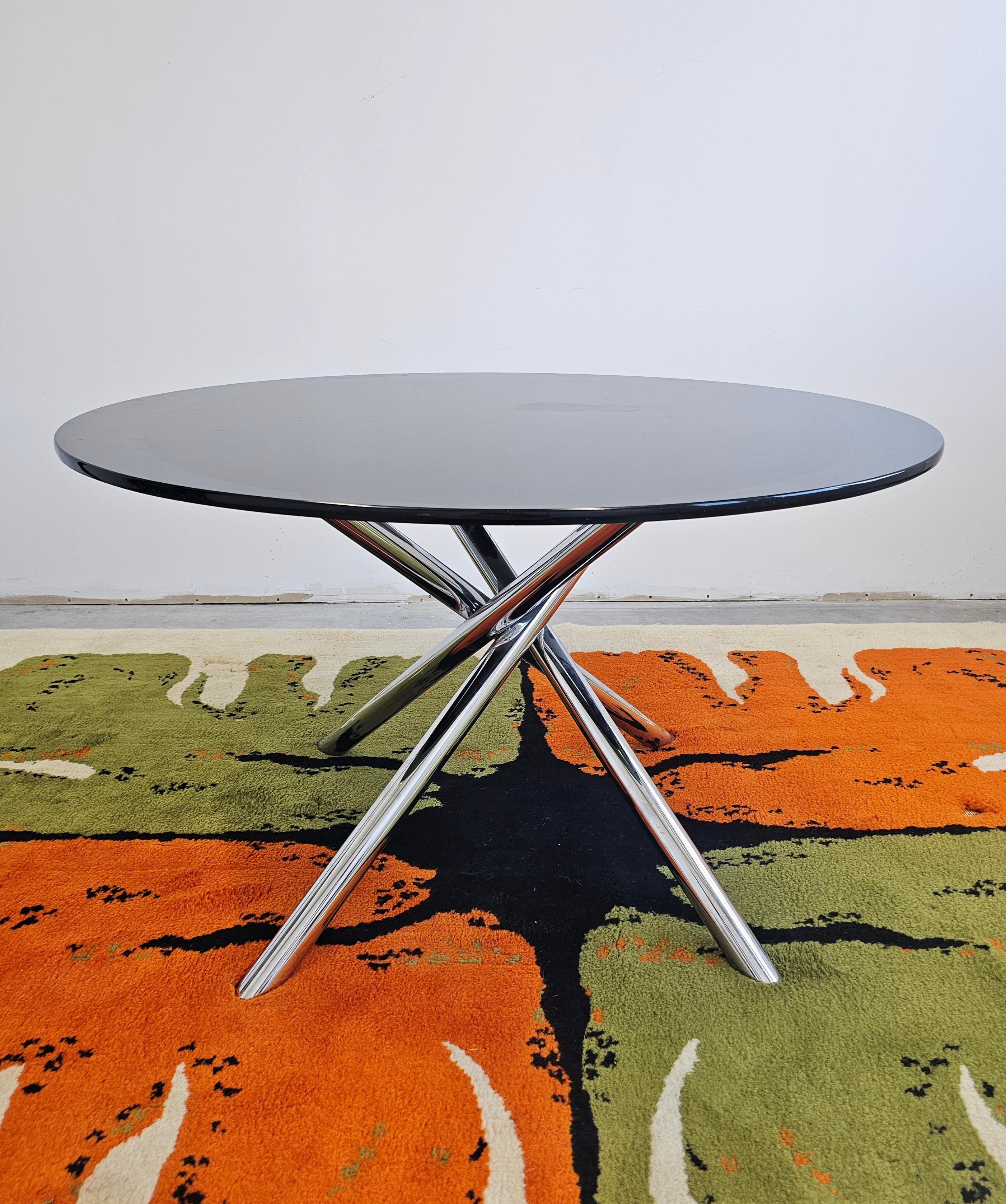 In this listing you will find a Postmodern Dining Table 
