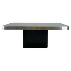Postmodern Dining Table with Black Glass Top
Brass Accent Postmodern Dining Table with Black Glass Top
Brass Accent