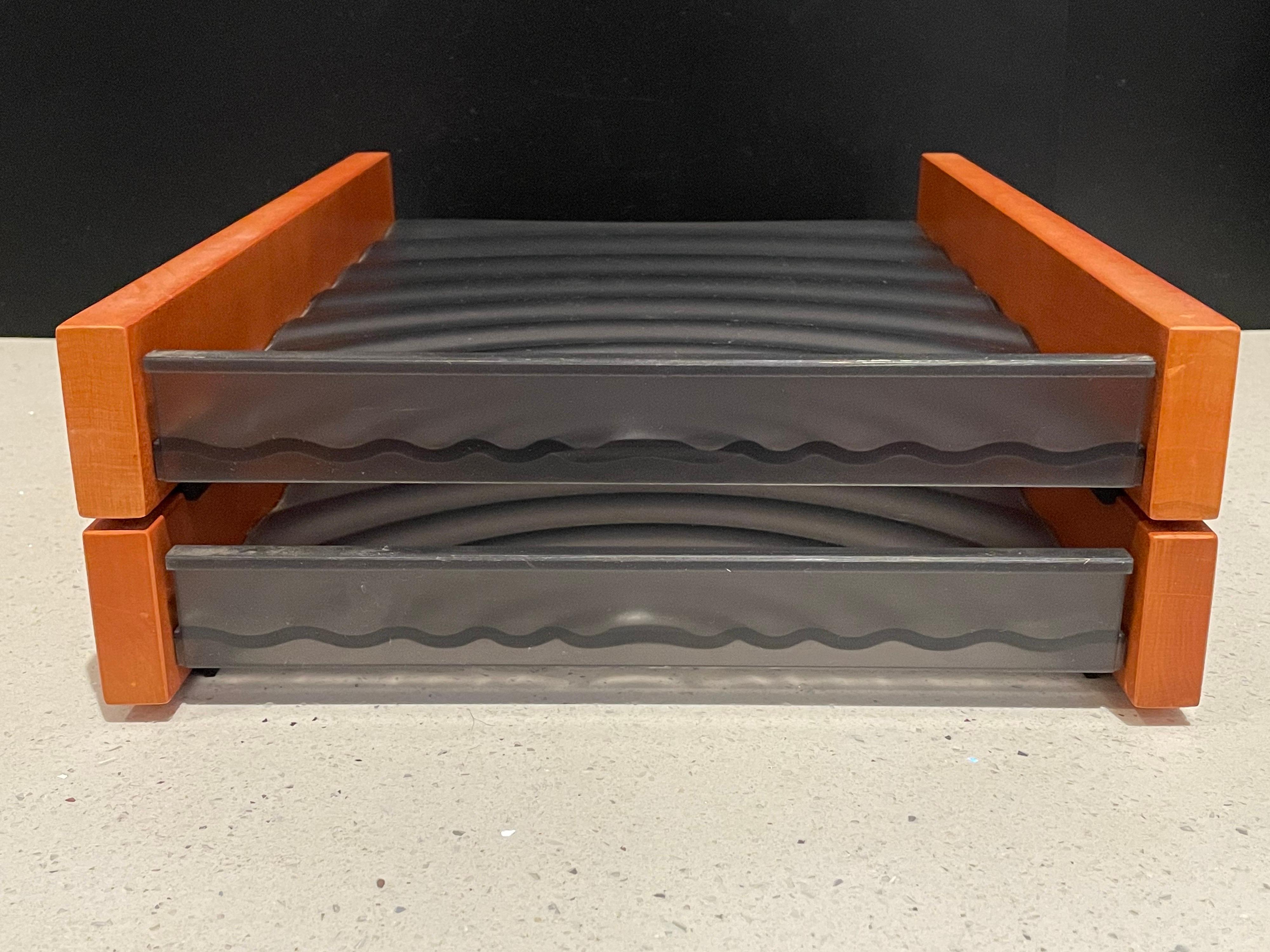 Great design on this double-deck desk letter tray , molded wave smoke plastic with solid cherry wood sides, and rubber anti-slippery feet.