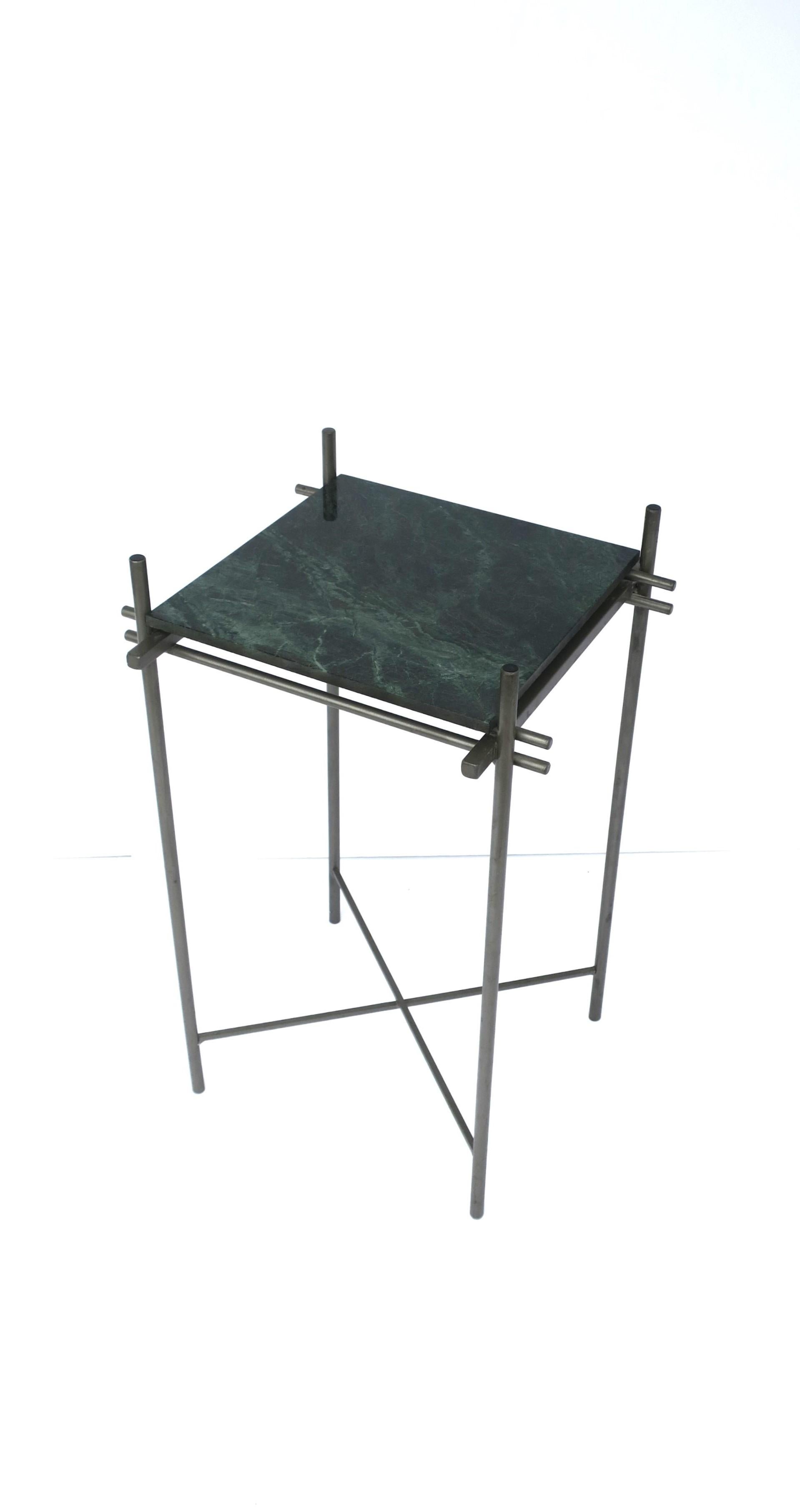 An Italian Postmodern side drinks table with a grey gun-metal frame and dark green marble top, circa 1990s, Italy. A great table for drinks/cocktails in a convenient size. Very good condition as shown in images and video. Parcel shipping available.