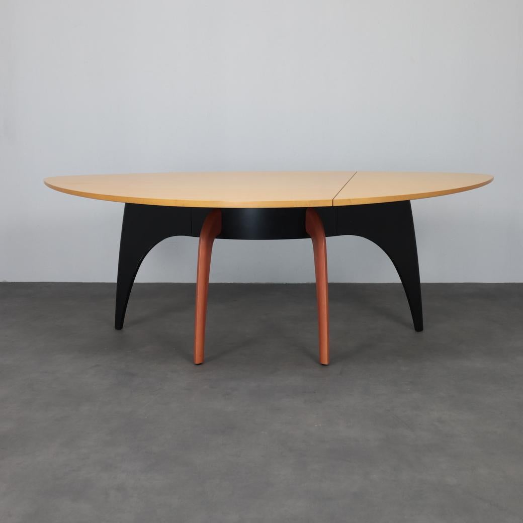 Designed by Dutch designer Dick Spierenburg for Castelijn in 1990, the ‘Foliant’ dining table is a sculptural ode to natural form and organic geometry. The soft triangular tabletop and fluidly curving legs evoke the unfolding of a leaf — a theme