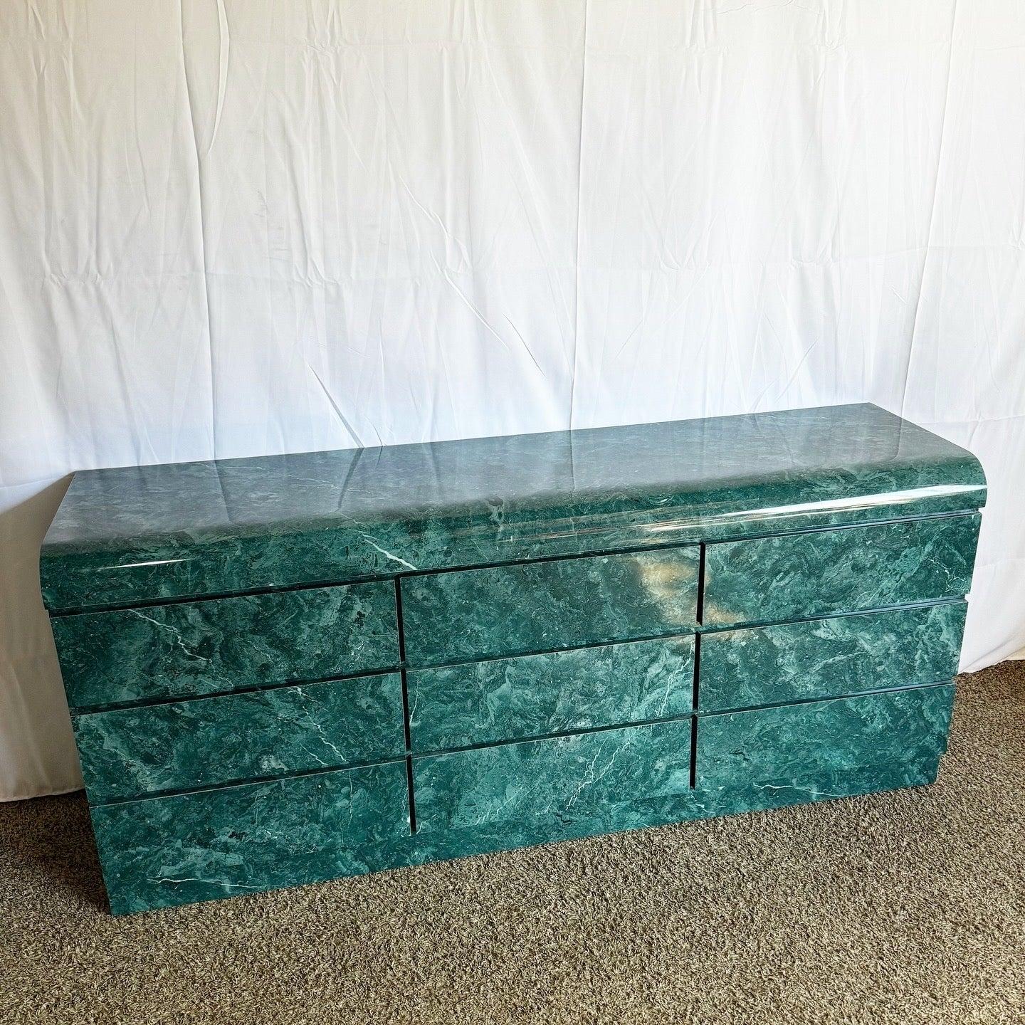 Discover the Postmodern Faux Green Marble Dresser, featuring a sleek waterfall design and nine drawers, perfect for modern interiors. 
 
 Some chip on the bottom on one of the sides.
 
 We sell items as acquired, without restoring or repairing.