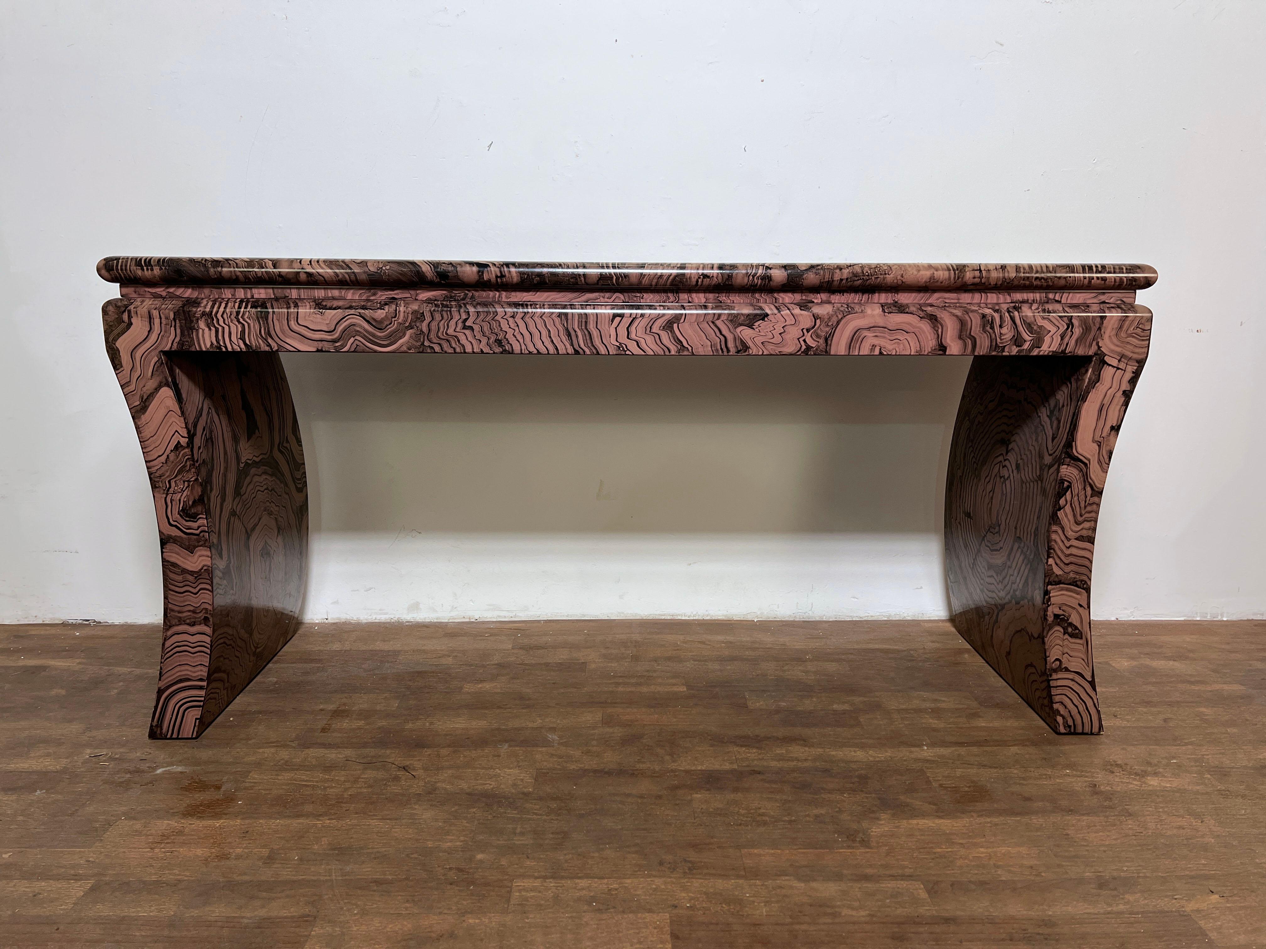 A dazzling 1970s postmodern console in lavender lacquer with hand finished faux marbling.