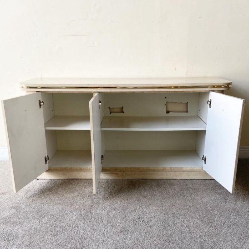 American Postmodern Faux Travertine Laminate Credenza with Gold Trim For Sale