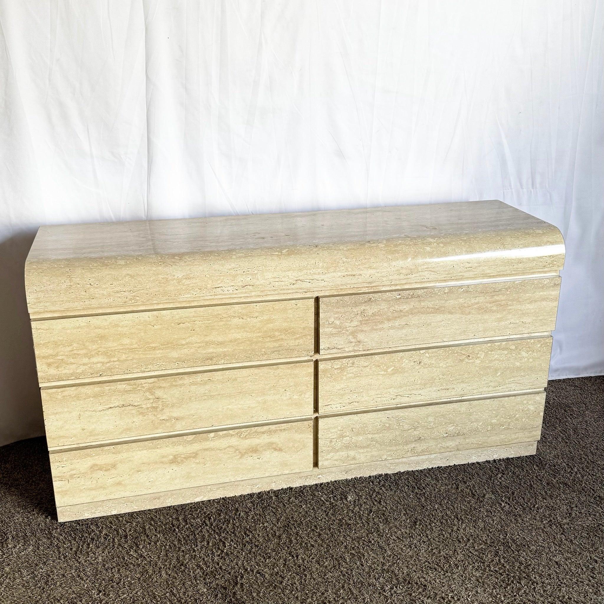 Elevate interiors with a Postmodern Travertine Waterfall Dresser—six-drawer elegance with sculptural appeal.
 
 We sell items as acquired, without restoring or repairing. Vintage pieces may have age-related wear. Review photos carefully, ask