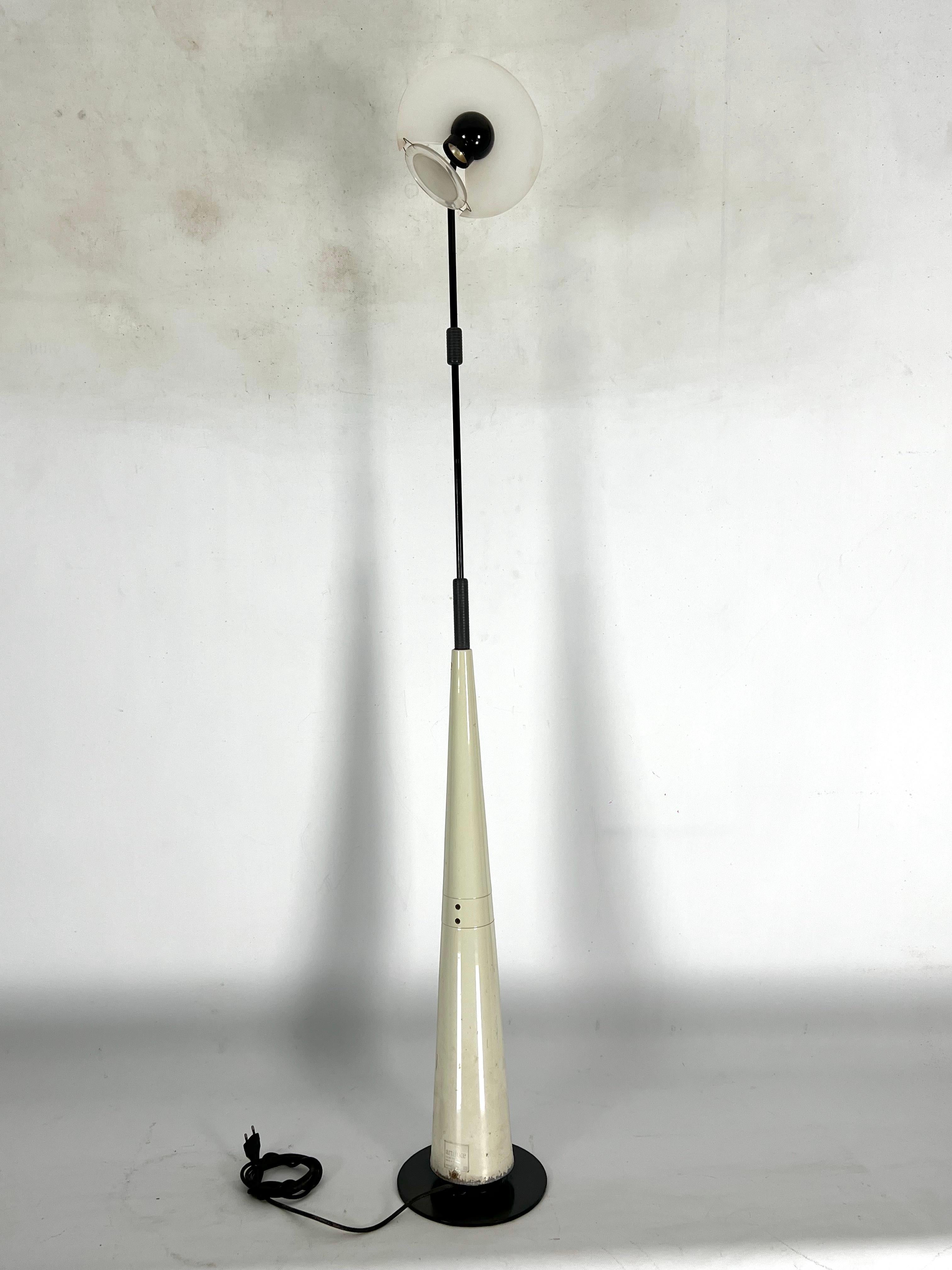 Adjustable floor lamp model Club 1195, designed by Giuseppe Ramella for Arteluce and produced in Italy during the 80s. Fair vintage condition with trace of age and use. Some lack of lacquer. Glass with no chips or cracks. Full working with EU