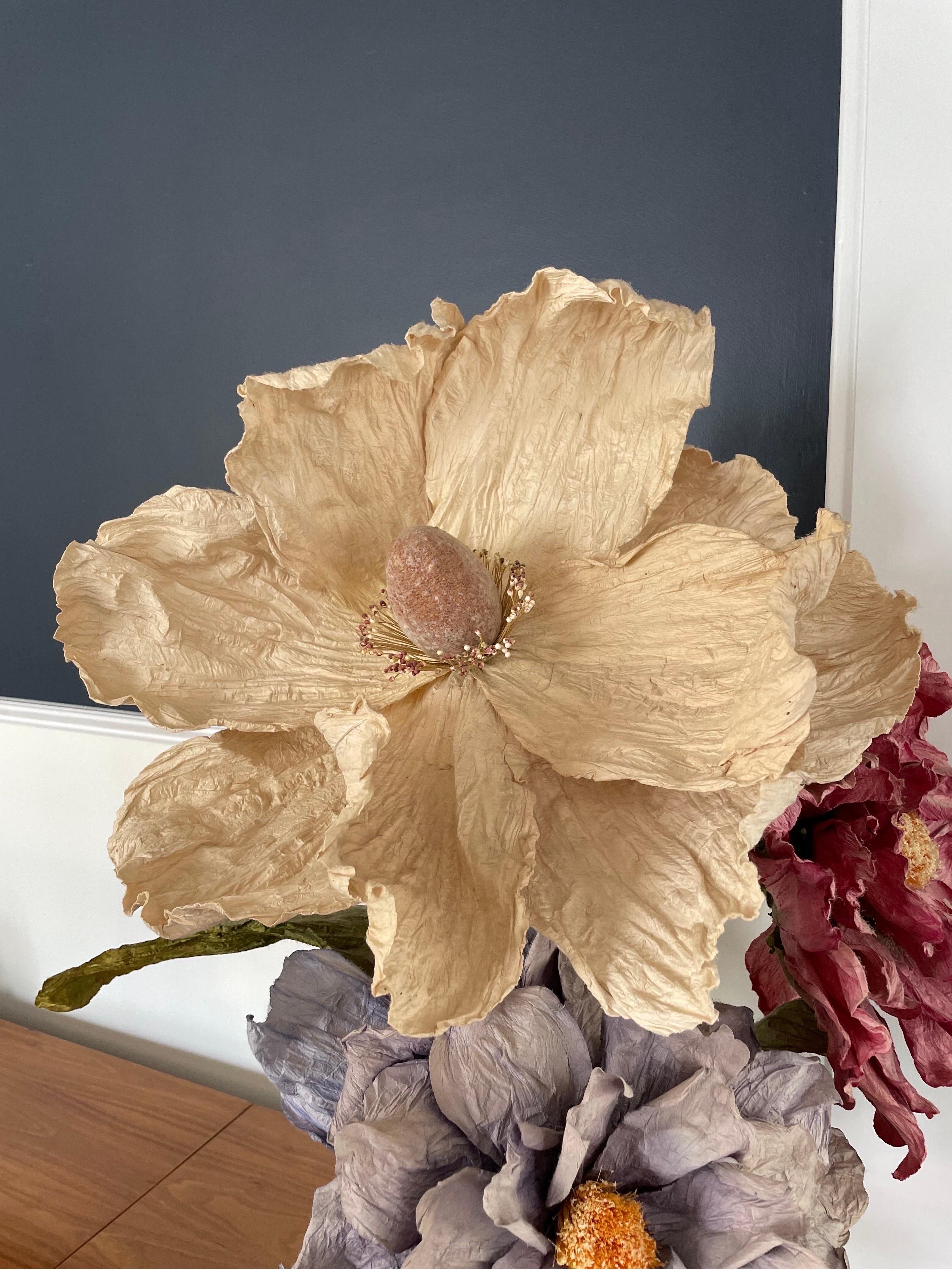 artificial flowers in floor vase