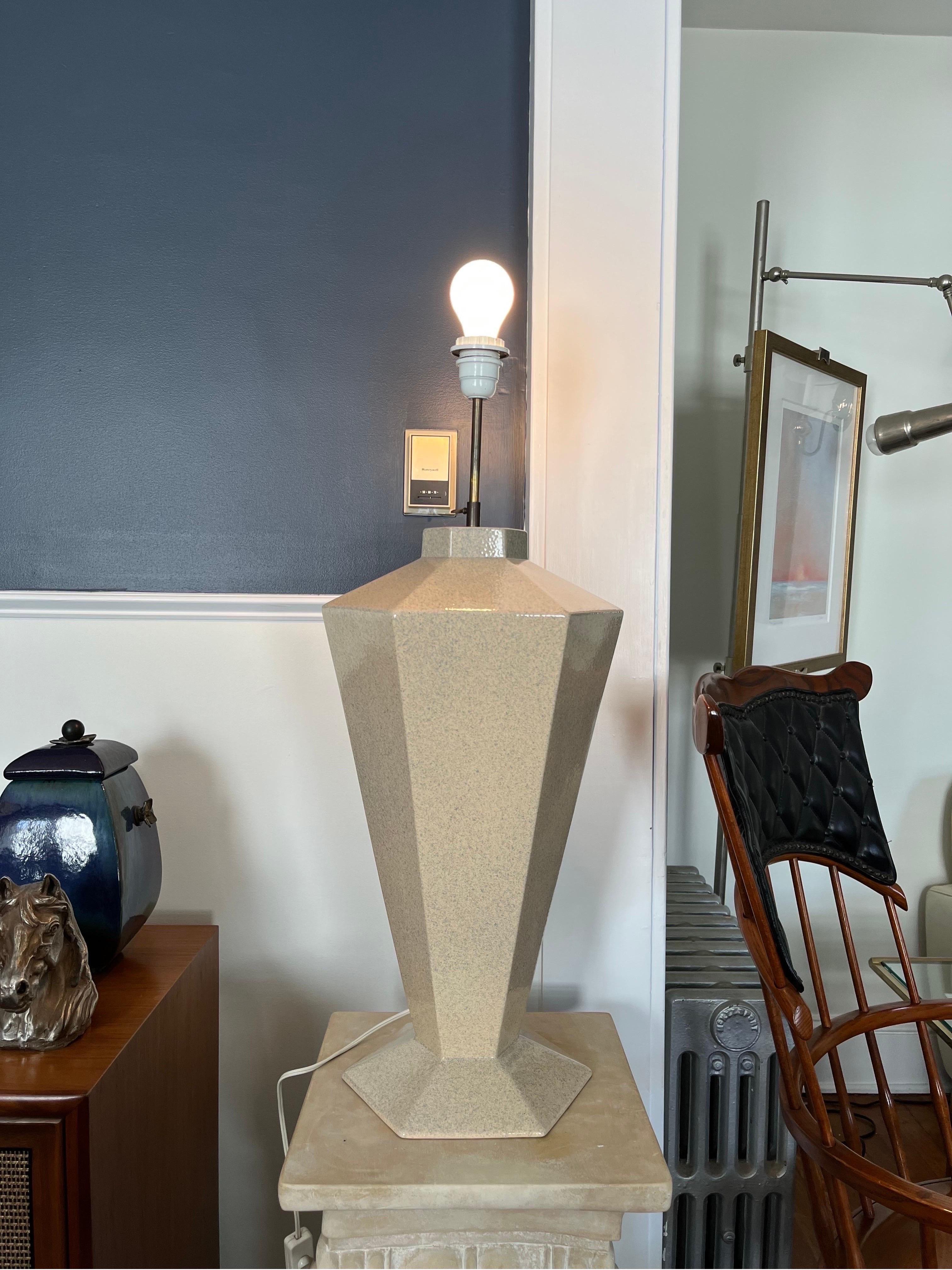 Unique ceramic lamp with a tapered hexagon design. Postmodern Deco styling with a glossy speckled ceramic finish. Adjustable stem an socket for versatility with shade choice.