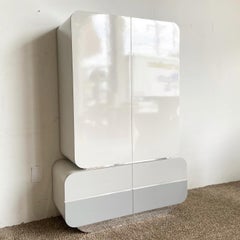 Postmodern Galactic Three Tone Gray and Chrome Double Waterfall Armoire