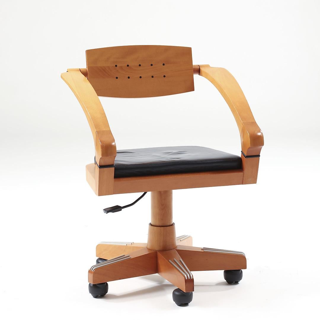 SPRING is a small armchair in polished solid beech wood, with ebony insets in the backrest.‎ The seat is in nondeformable polyurethane, with fabric or leather covering.‎ The arms and the back are connected to the seat by a solid beech wood part