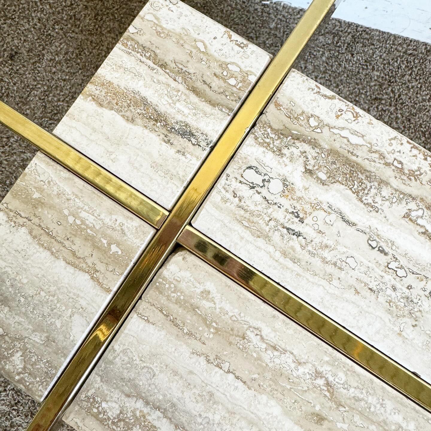 Explore the postmodern elegance of the Glass Top and Gold Travertine Side Table. This statement piece features a sleek glass top and a robust gold-travertine base. It perfectly embodies the 1980s design ethos by juxtaposing transparent glass with