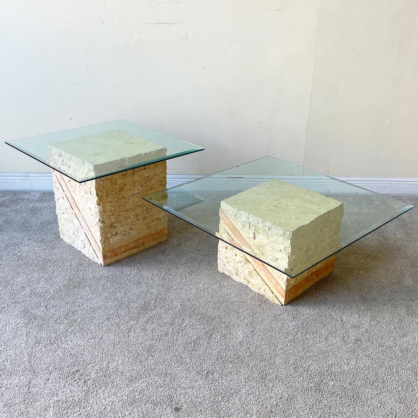 Amazing coffee and side table set with square beveled glass tops. Bases of tables both feature a tessellated rough stone with a pink polished stone stripe.

Additional information:
Material: Stone
Color: Beige, Pink
Style: Postmodern
Time Period: