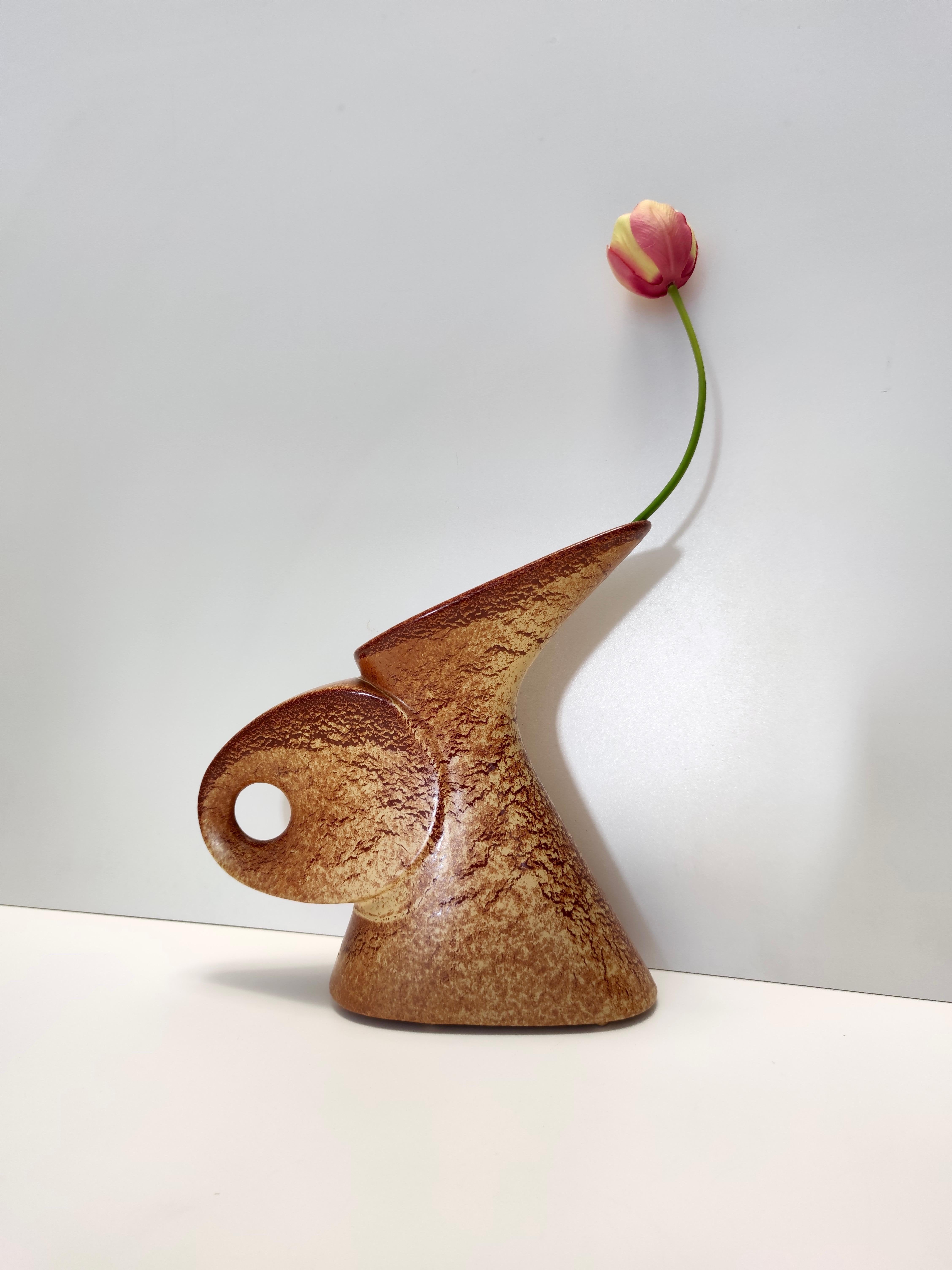 Made in Italy by Giovanni Bertoncello for Schiavon, 1970s.
It is made in brown glazed ceramic.
It is a vintage piece, therefore it might show slight traces of use, but it can be considered as in excellent original condition and ready to become a
