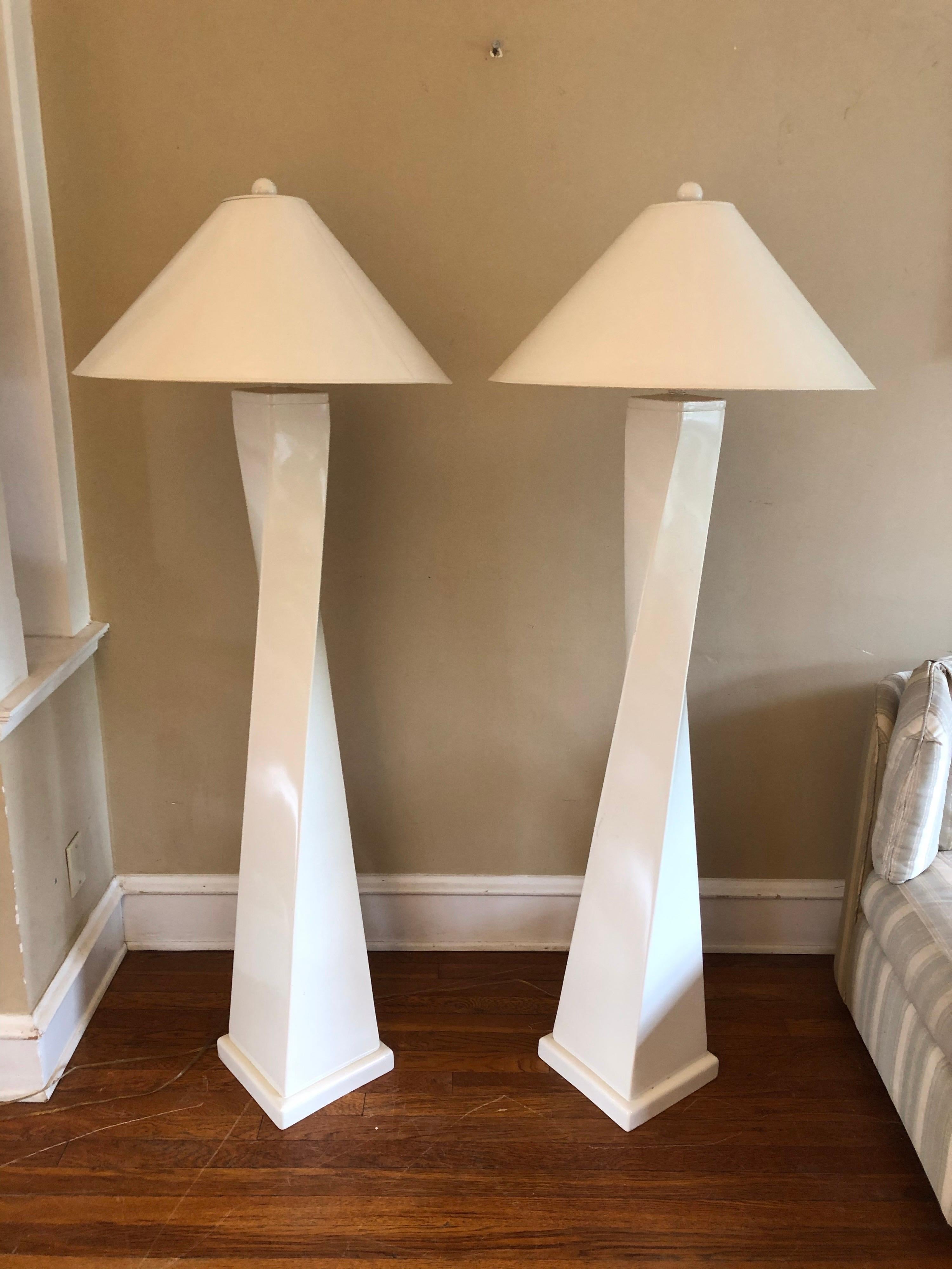 Interesting “twisted” Post-mod floor lamps by Tyndale Lighting, a division of Frederick Cooper. Original shades will be included, a high-gloss cream color, matching the lamps. They’re seemingly lacquered over ceramic. They’re in excellent condition.