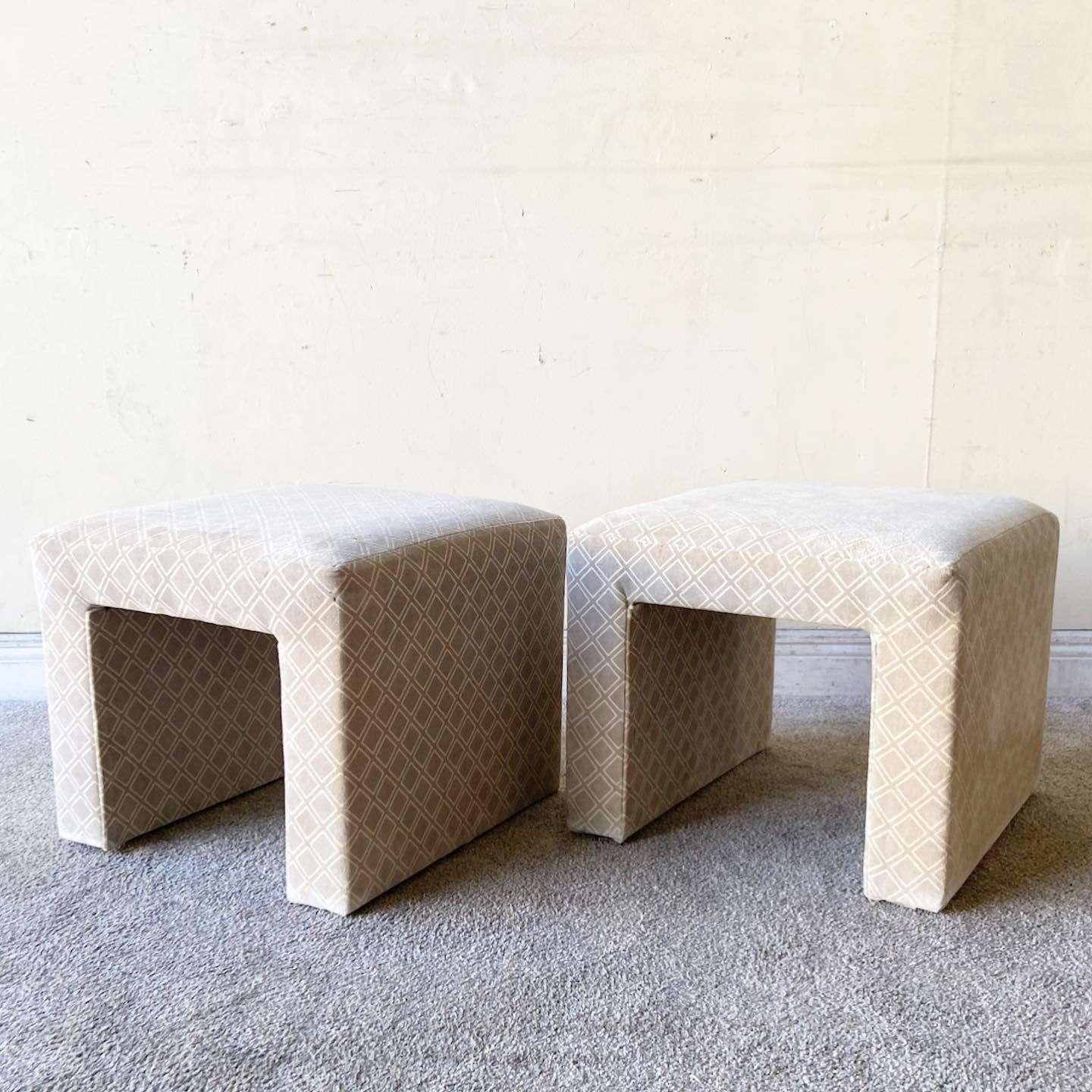 Amazing pair of vintage postmodern fabric low stools. Each feature a grey and beige fabric.
