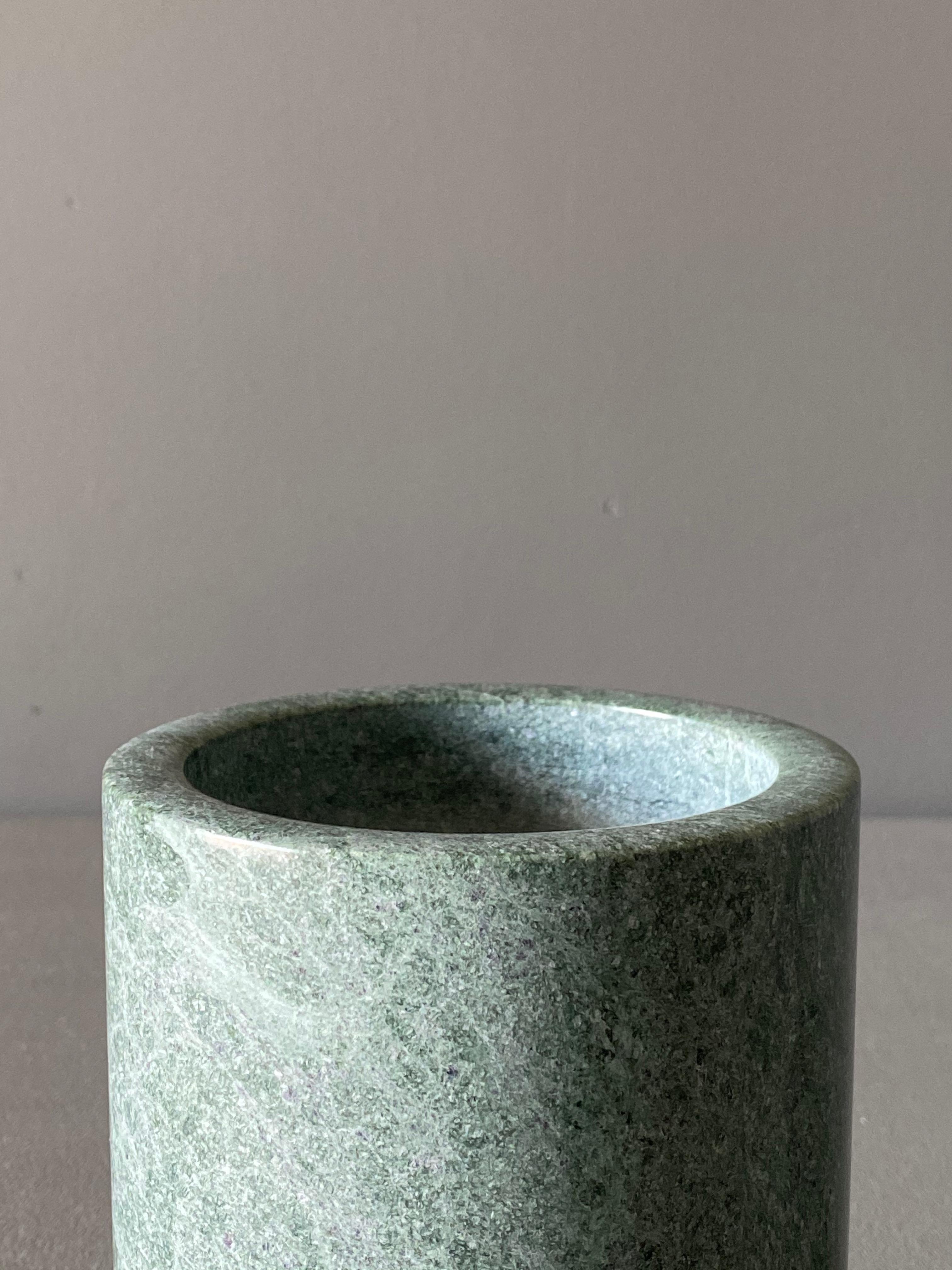 Postmodern green marble vase, circa 1985.