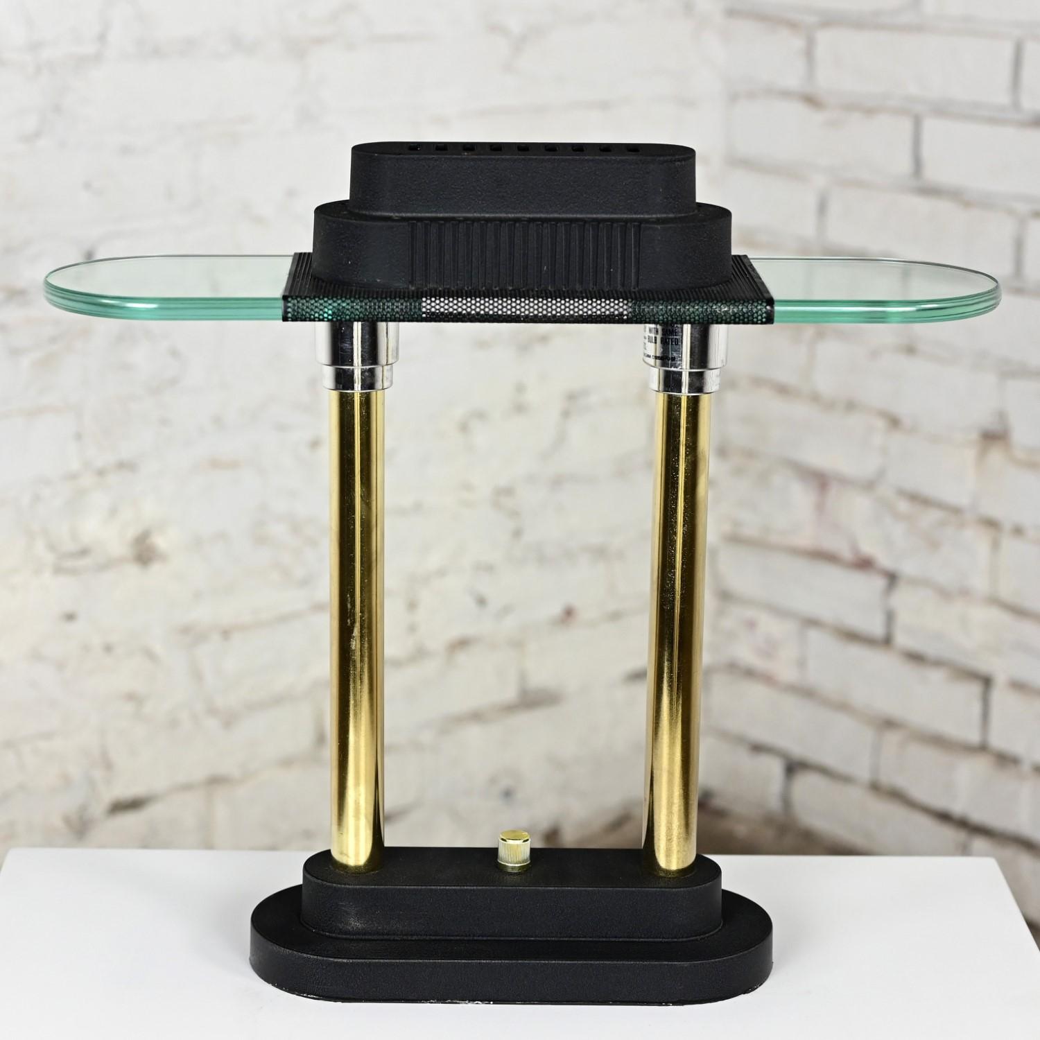 Marvelous vintage Postmodern halogen table lamp style of Robert Sonneman for George Kovacs with brass plated double shaft, chrome plated capitals, black painted metal top & base, dimmer switch, and halogen lamp. Beautiful condition, keeping in mind