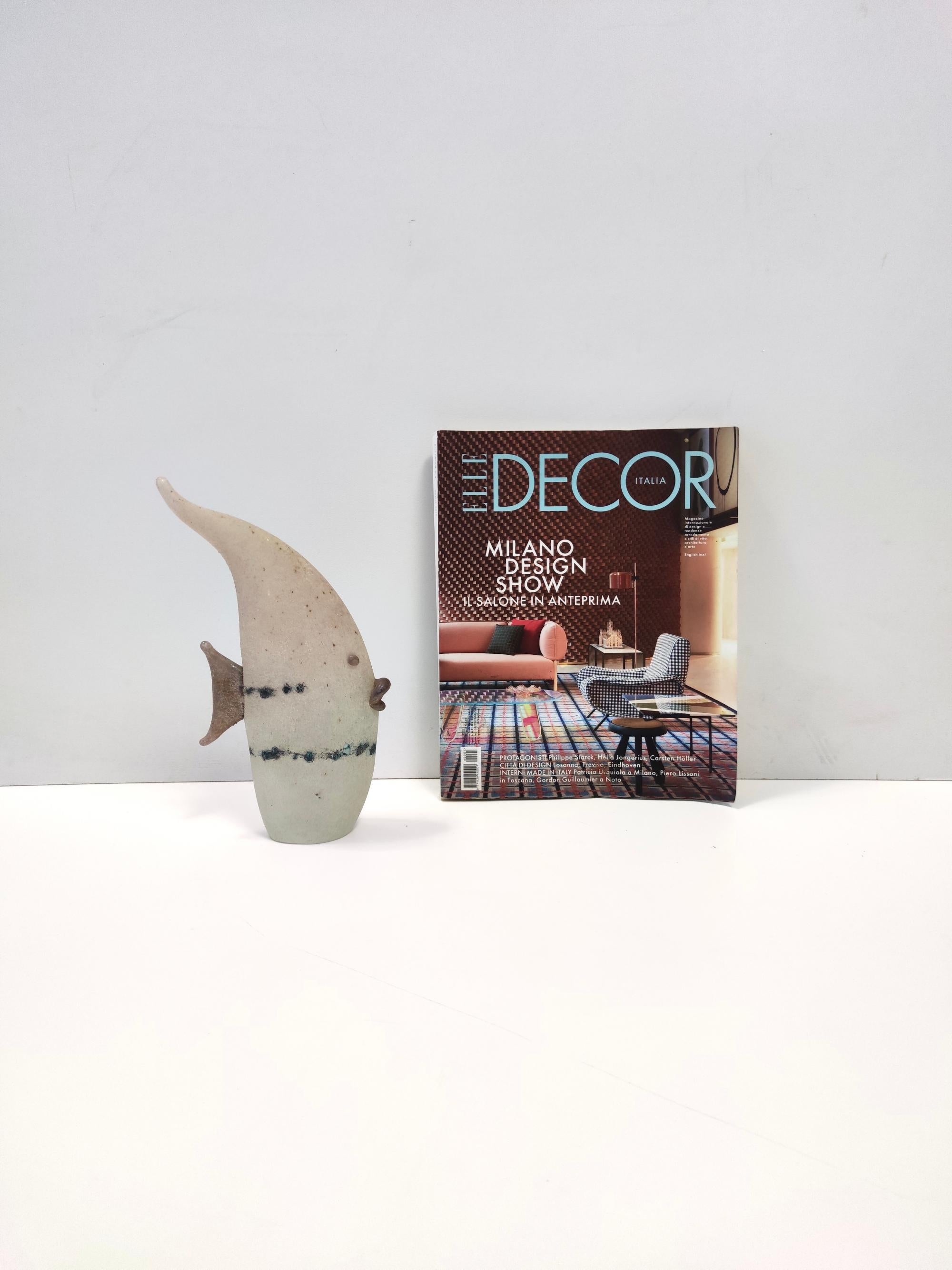Italy, 1970s.
This fish is made in hand-blown polychrome scavo glass, with darker glass parts that have been applied and hot-shaped. It is signed by Luigi Mellara.
It is vintage, therefore it might show slight traces of use, but it can be considered