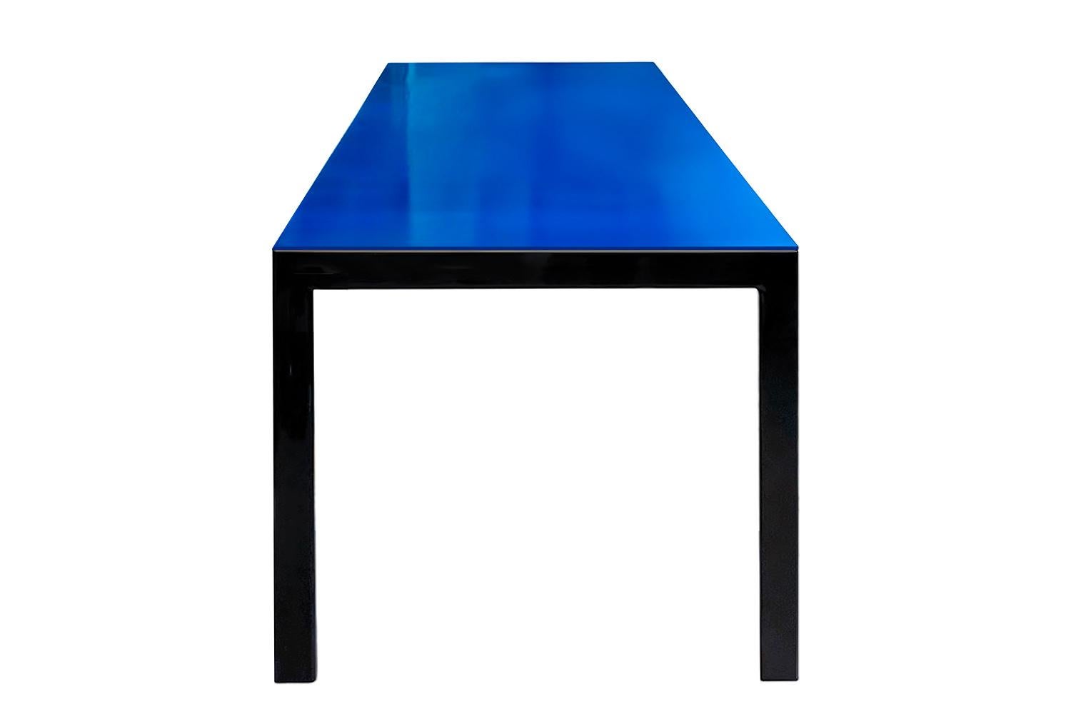 The Anhelo Dining Table is an ode to desire, to that quiet and persistent force that drives us toward what we yearn for most. Its high gloss blue lacquered surface reflects not just light, but the depth of longing itself, creating a mesmerizing play