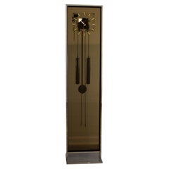 Postmodern Howard Miller Bronze Plexiglass & Chrome Weight Driven Floor Clock