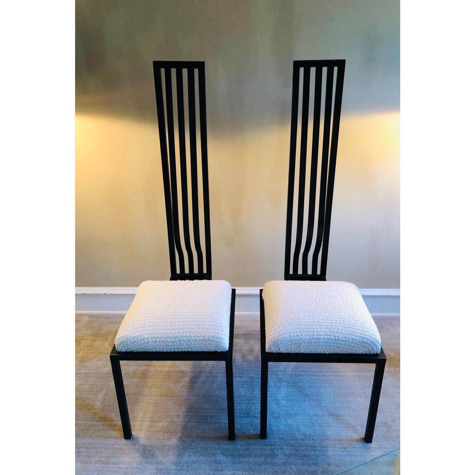 Very tall iron chairs, Italian in origin. Solid & unusual.