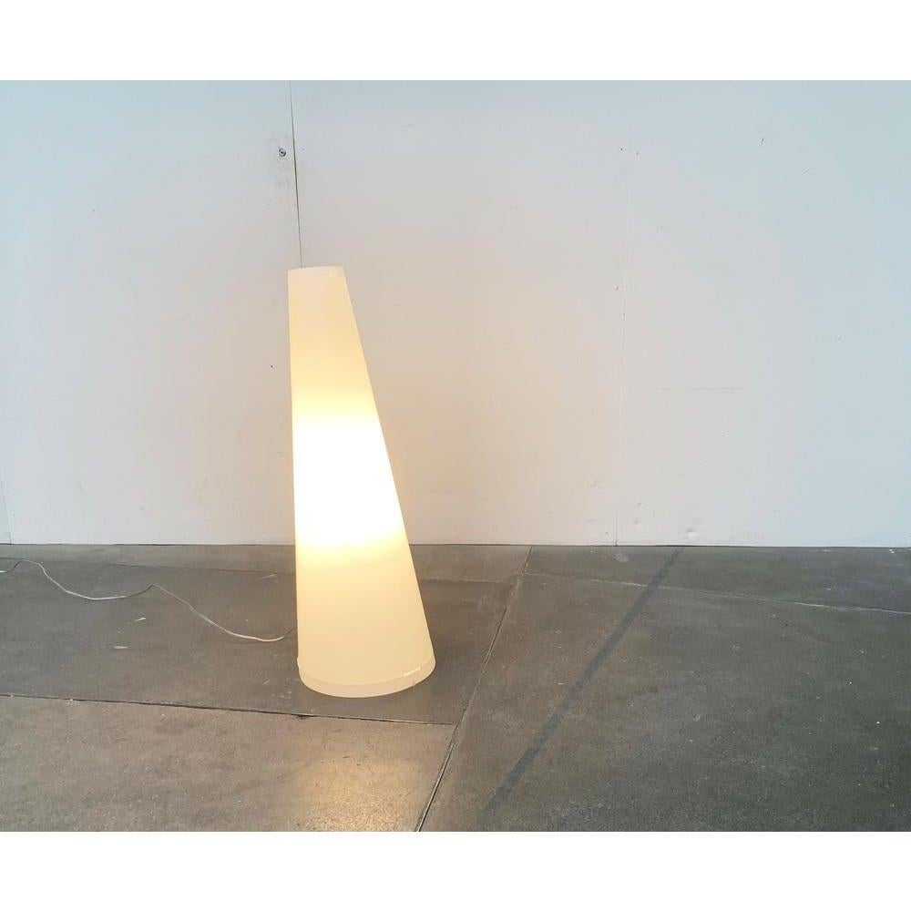Tapered plastic floor lamp from Italian manufacturer Emporium. This piece has an attribution mark.
European Plug (up to 250V).The wiring of this item may be original and might need replacement, if not specified otherwise.

Additional