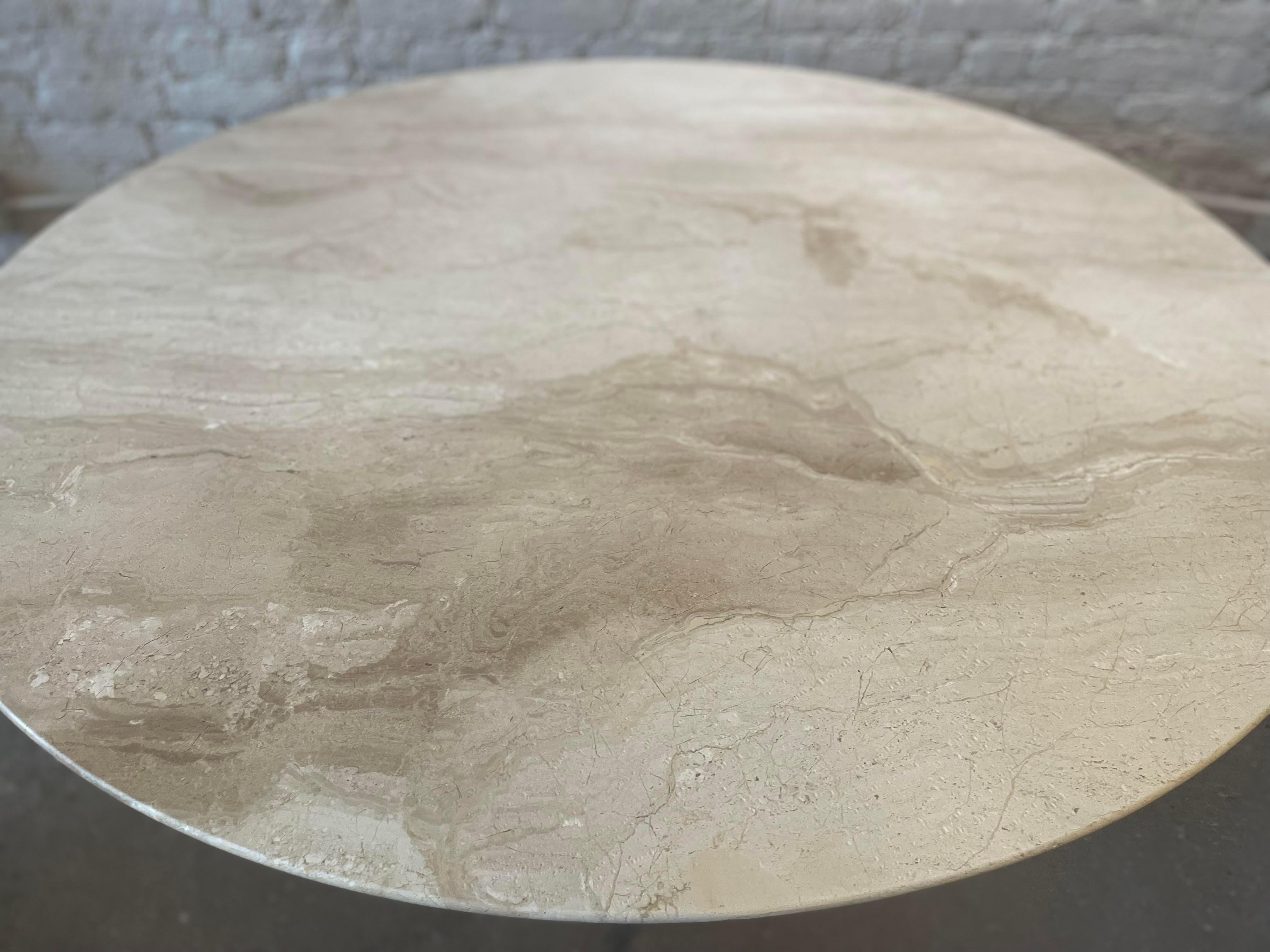 Beautiful travertine that was professionally honed to bring out the natural stunning veining.
Use as a dining table for 5 or a statement entry way table.