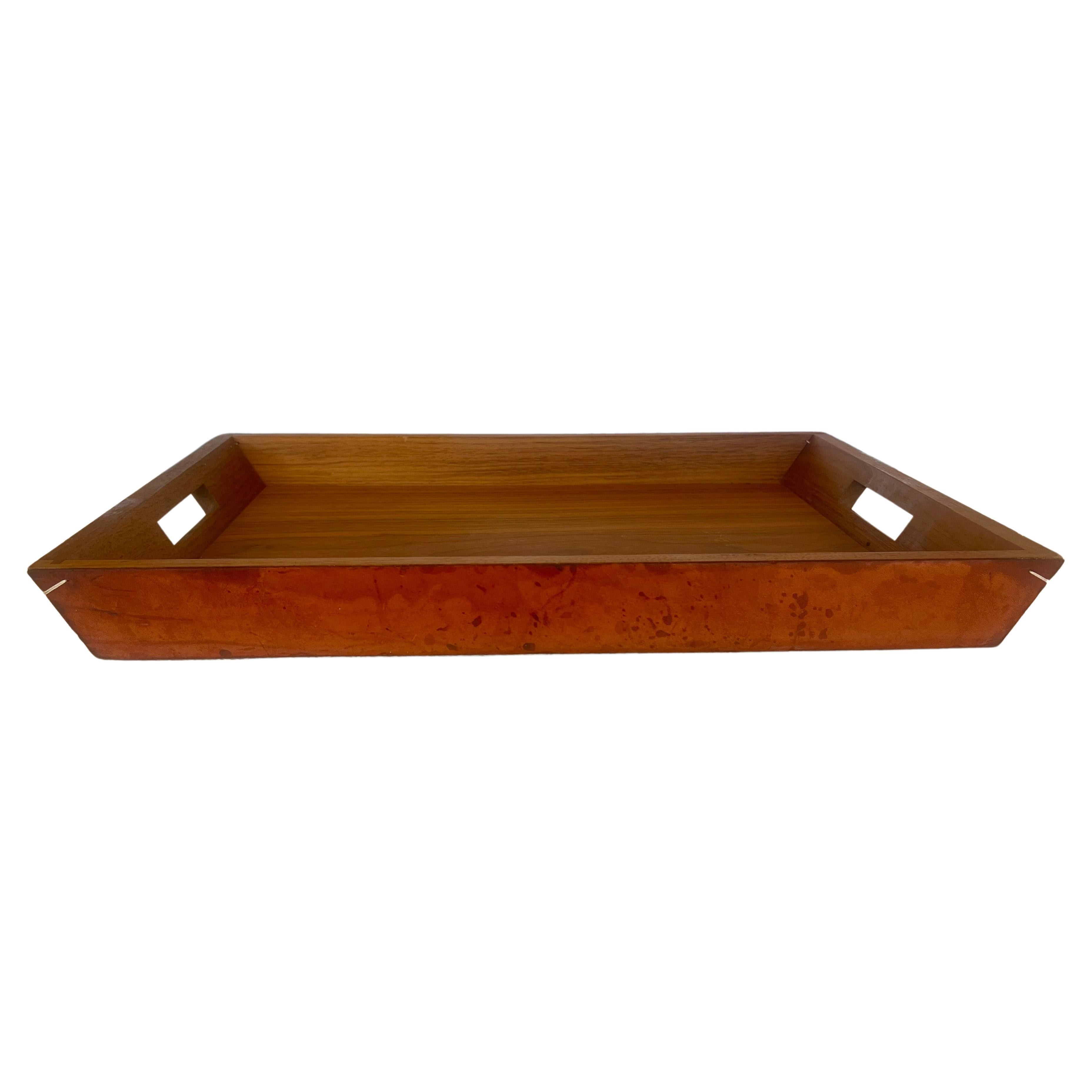 Beautiful elegant solid walnut tray with handles wrapped in patinated leather , by arte & Cuoio , made in Italy circa 1980's great detail with elegant white cord touch in the corners , nice patina on the leather due to normal wear and tear