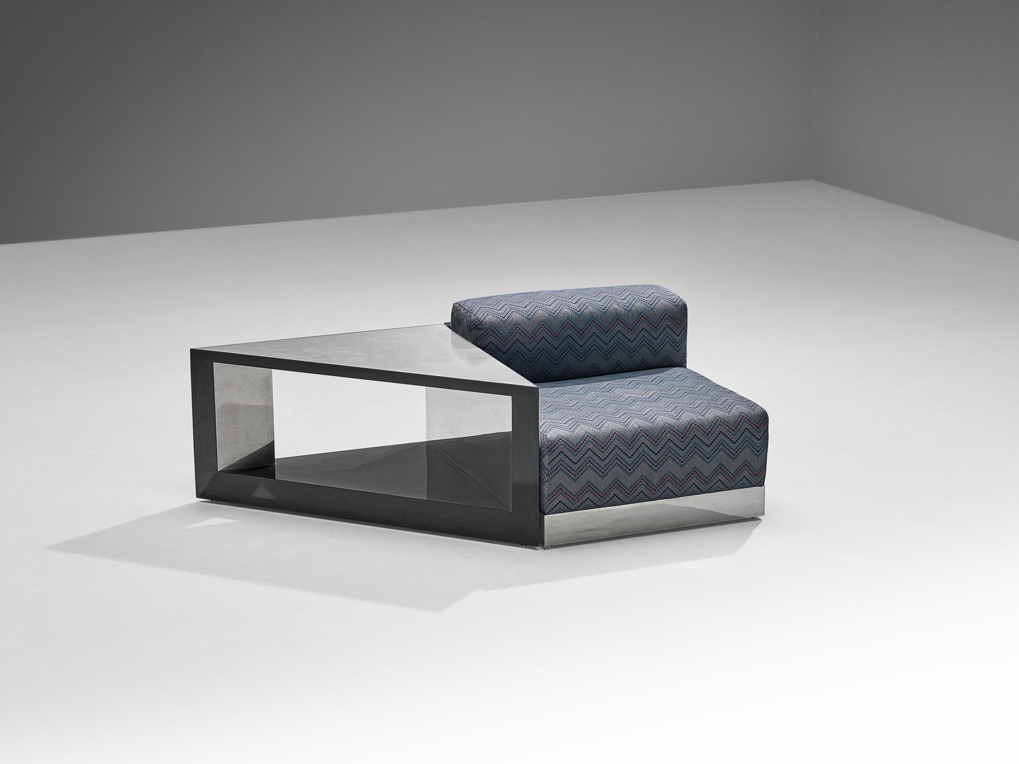 Sitting element and side table, laminated wood, stainless steel, fabric, Italy, 1980s

An Italian postmodern modular sitting element and side table. The design is bulky and shows typical features of the Space Age, such as the large, thick cushions