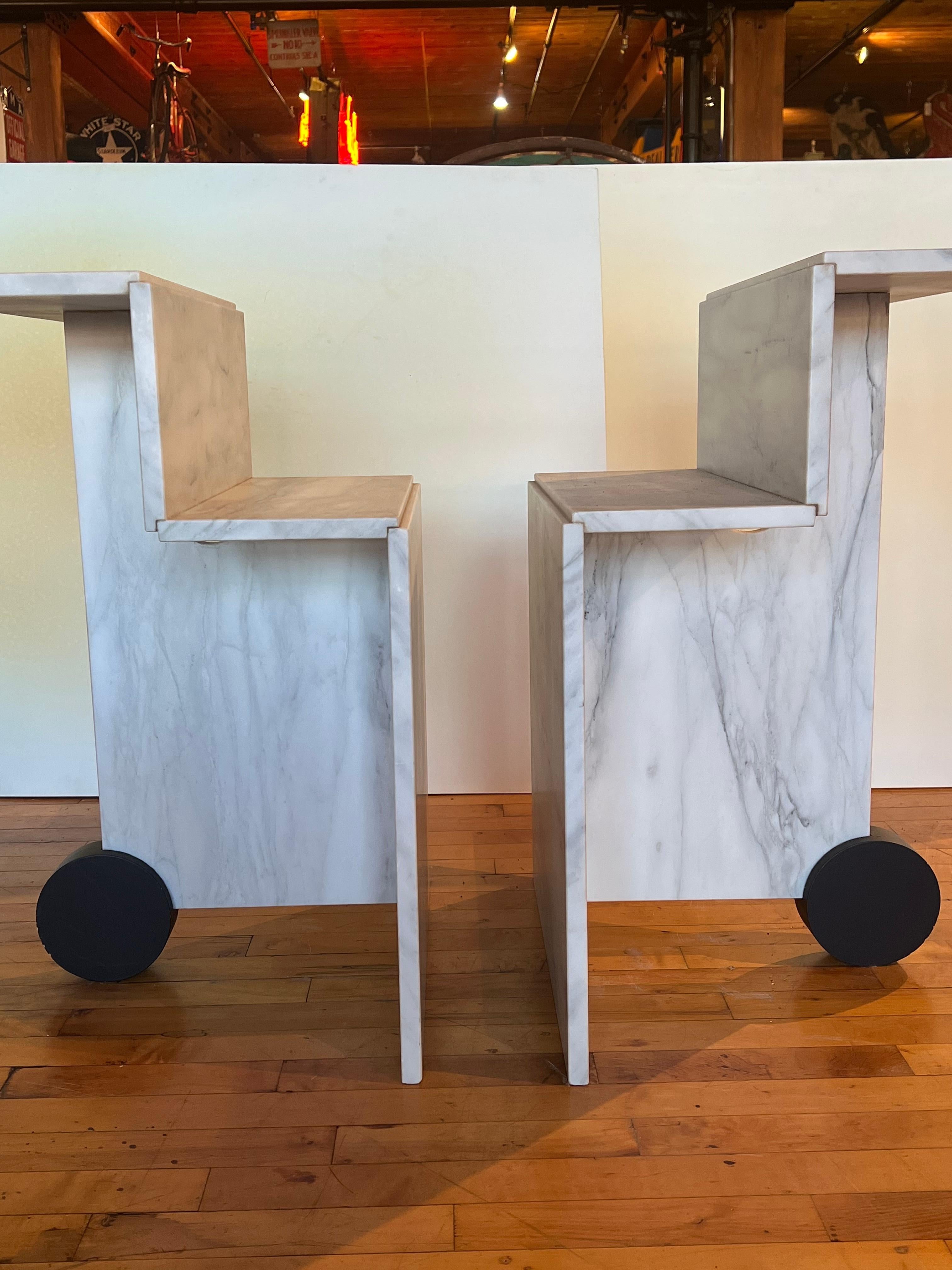 Post modern Italian marble side tables. Each top 8” deep and w 19.75”.