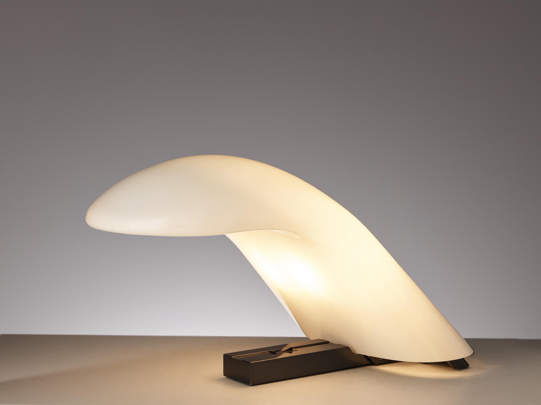 Table lamp, opaline glass, aluminum, Italy, 1980s 

This aesthetically looking table lamp from Italian origin shows an interesting shape resembling a great wave of the ocean through its bold, curved shape. The light shines through the opaline