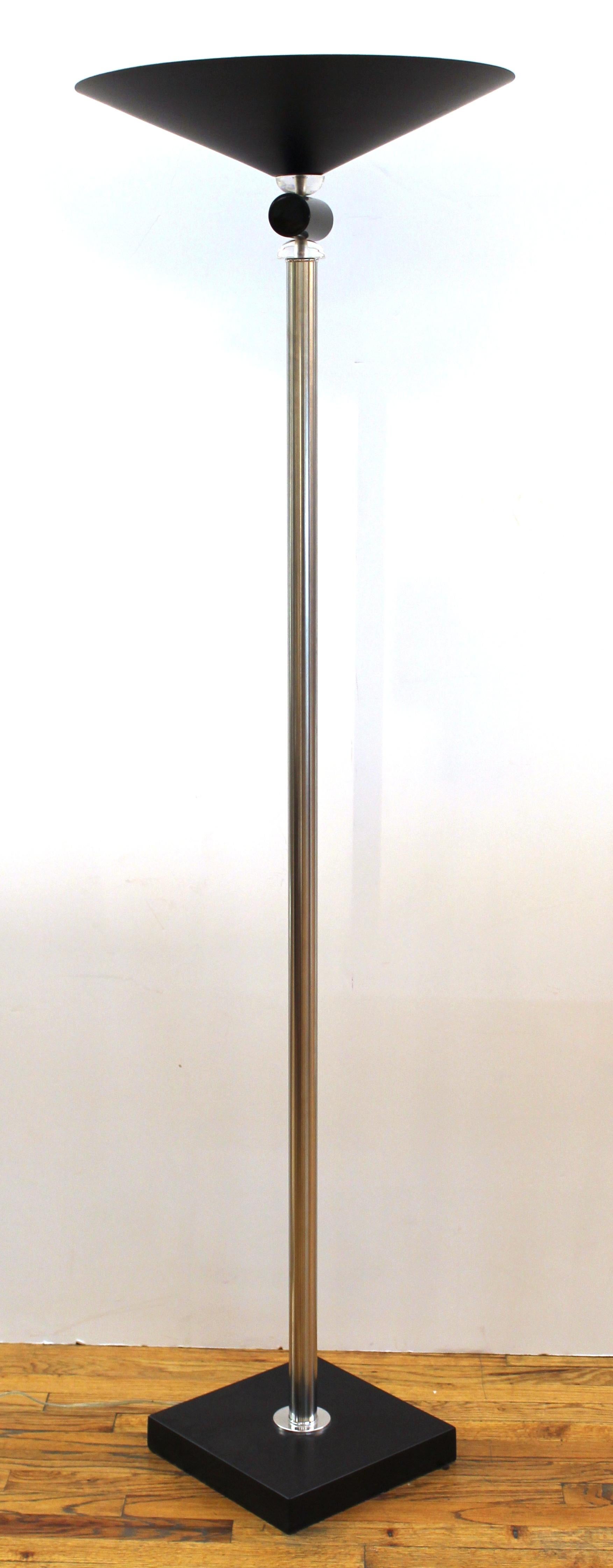 Postmodern Italian torchiere floor lamp in chrome with black enameled shade and acrylic elements.