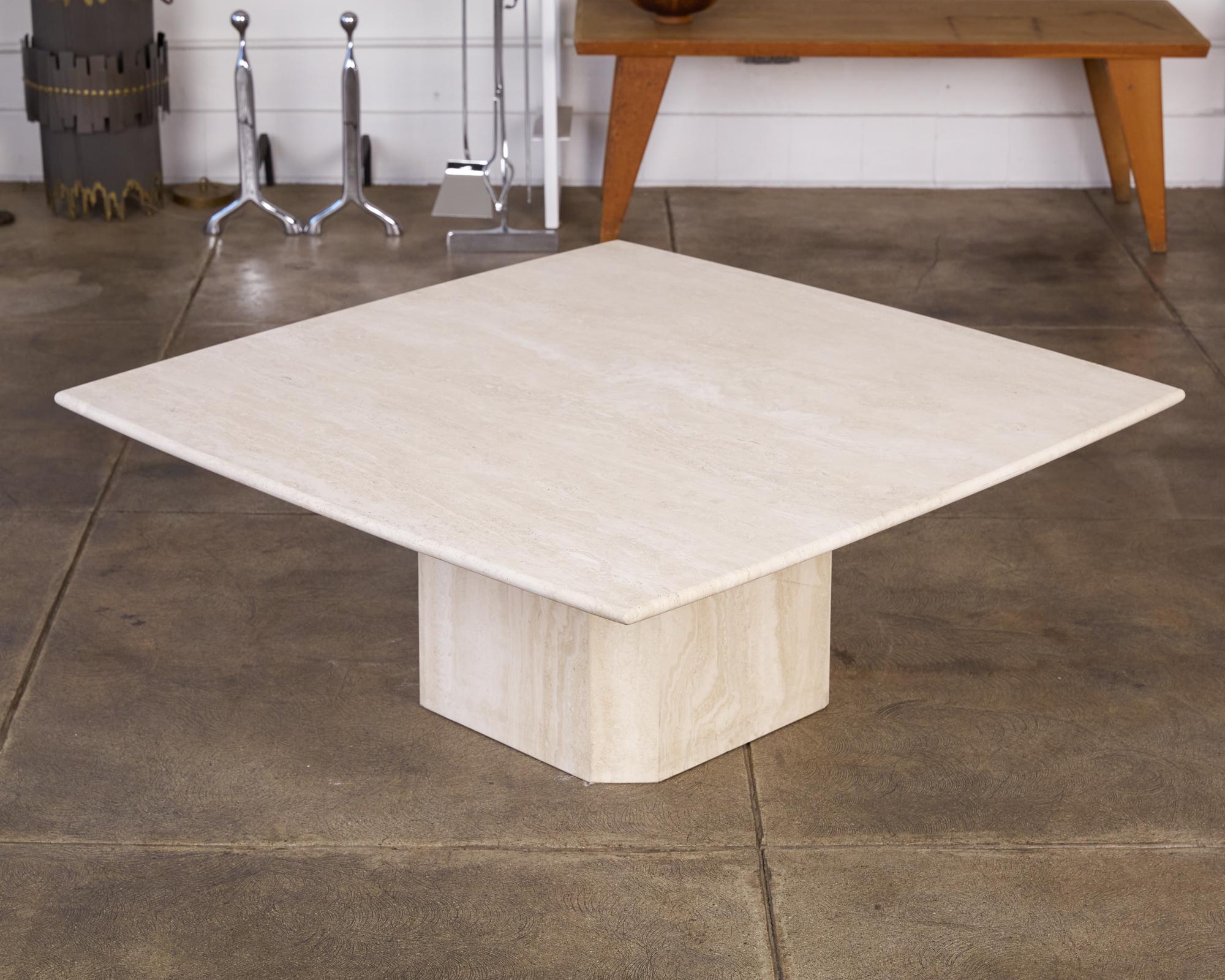 This travertine coffee table from Italy in the 1970s, while almost monolithic in size doesn’t take over a space but rather, acts as a compliment to those pieces it’s working in conjunction with. The travertine top has a matte finish and bull nose