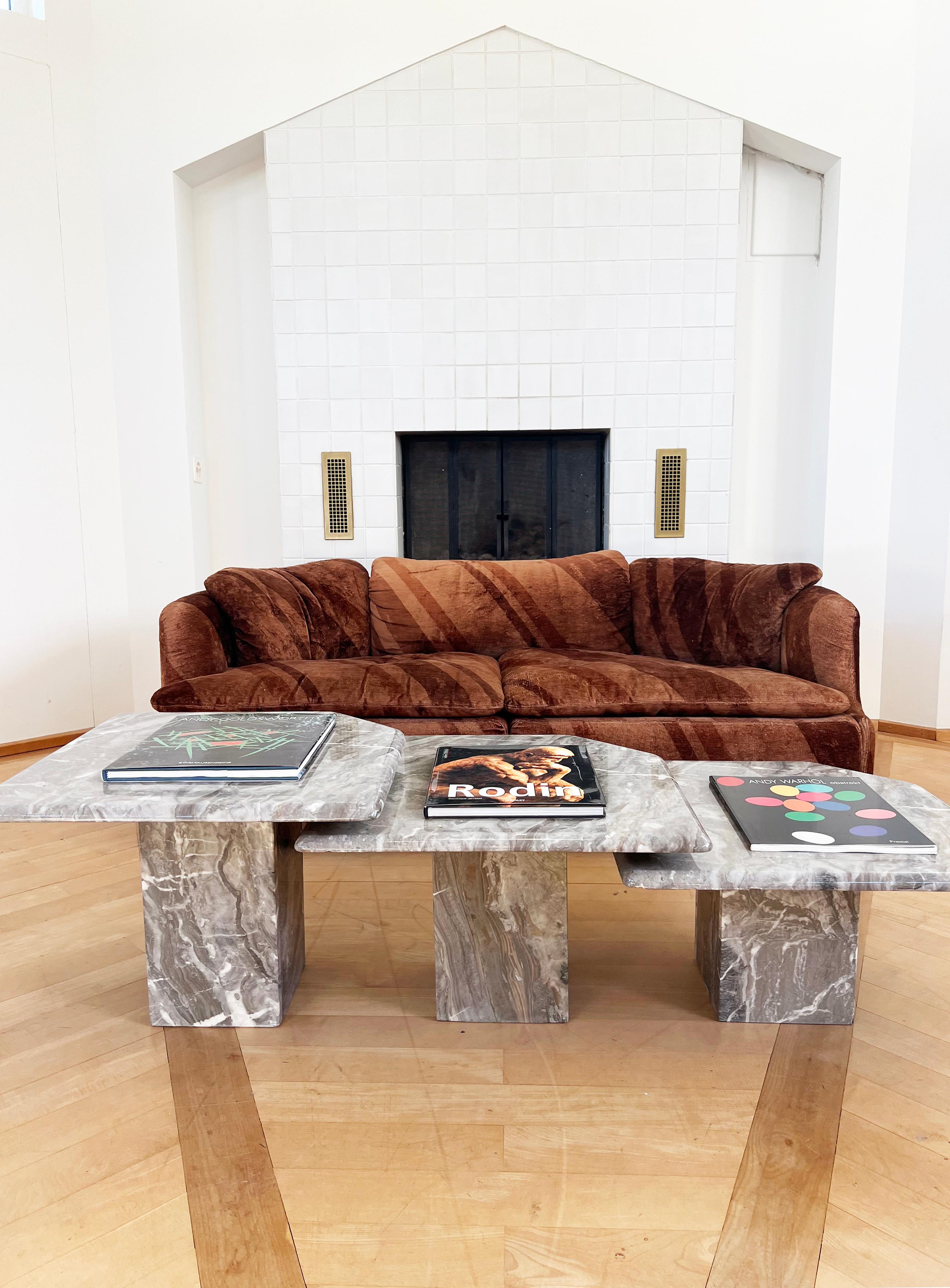 Beautiful solid marble nesting tables, with differing heights, to nest accordingly. 
Can be arranged in many different configurations. 
Incredible veining on the marble. Stunning set. 

Excellent set.

Dimensions:

Plates: 55 x 55 cm / 21 5/8