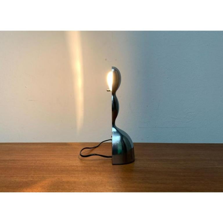 Very rare table lamp from the Italian manufacturer Nemo after a design by Ilaria Gibertini from the early 90s. A rarity that has not been on the market for years.

The shape of the lamp forms an elegant rotary body that widen down and trains one