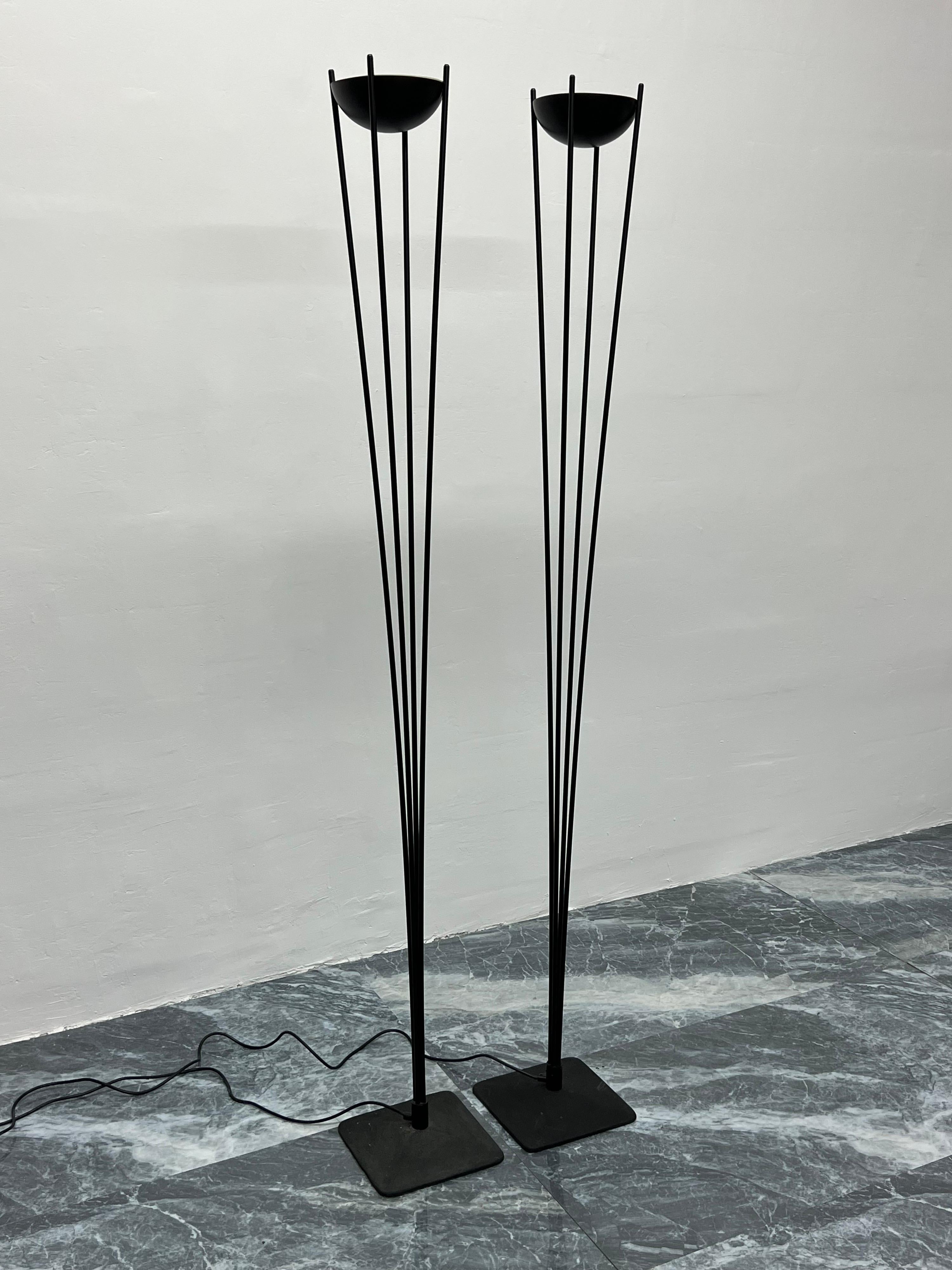 Rare matte black postmodern torchiere floor lamps with dimmable halogen bulbs by Koch & Lowy circa 1980s.