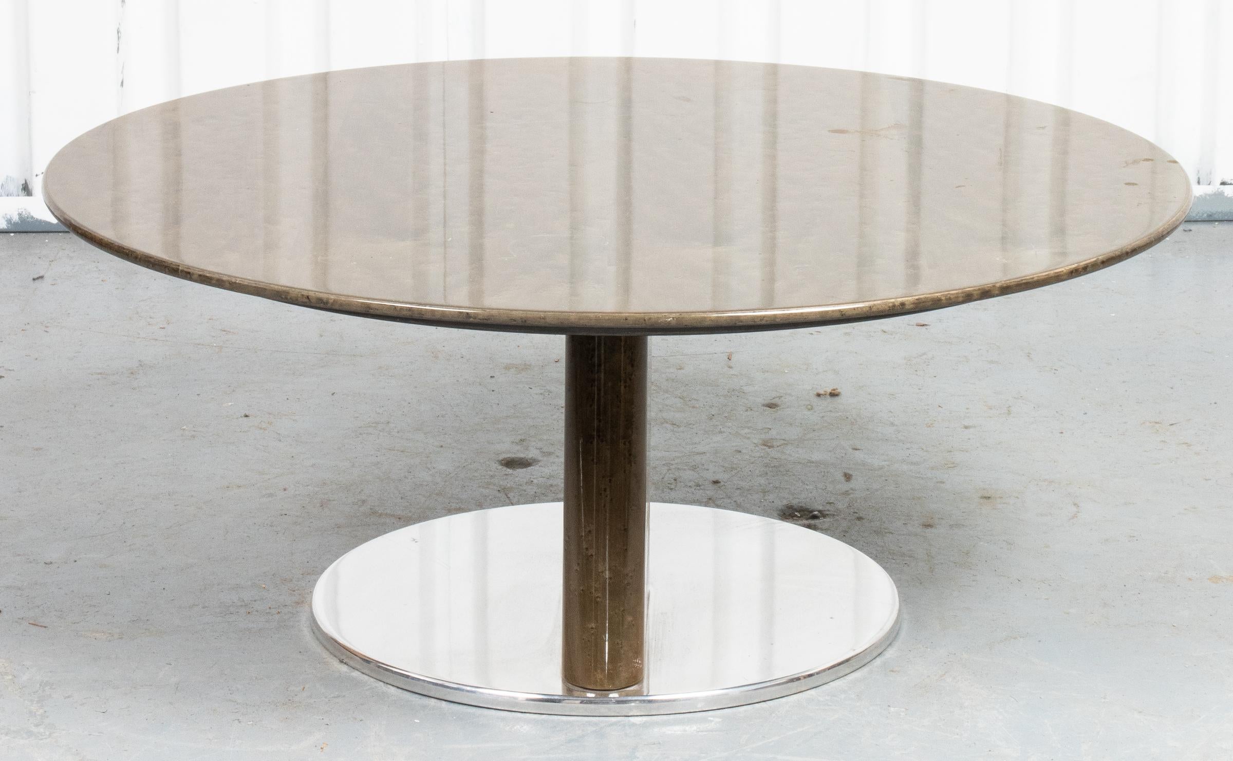 Postmodern lacquered burlwood round table on an angled chrome base in the Breuton manner. 13.5” H x 33.5” diameter.