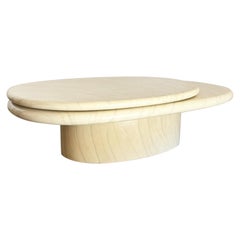 Postmodern Lacquered Faux Stone Swivel Top Oval Coffee Table