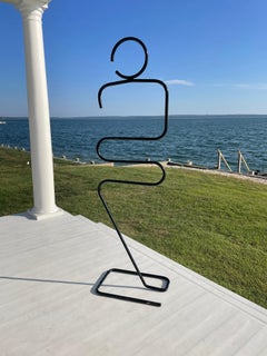 Postmodern Large Black Tubular Metal Figurative Valet Coat Rack