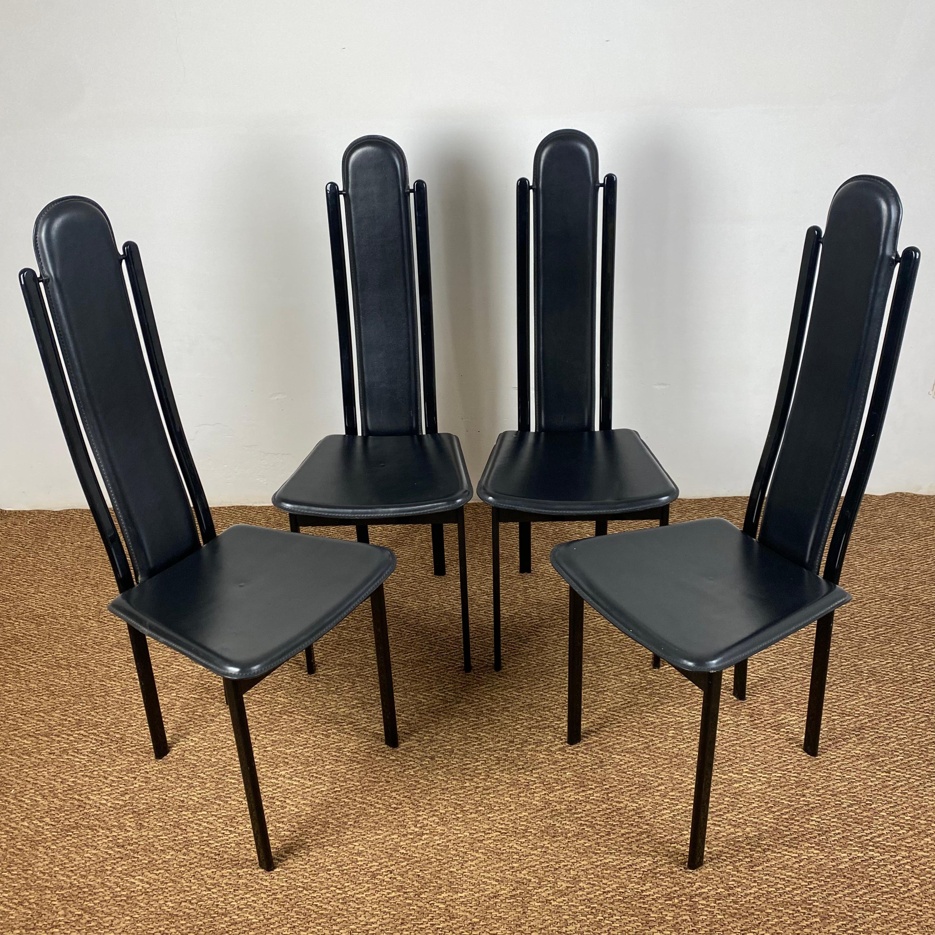 Set composed of four particular post-modern chairs made of leather and painted steel.

The chairs are in perfect condition with some small signs of wear, as shown in the photographs.

Production Recanatini, Italy, 1970-1980

Dimensions: