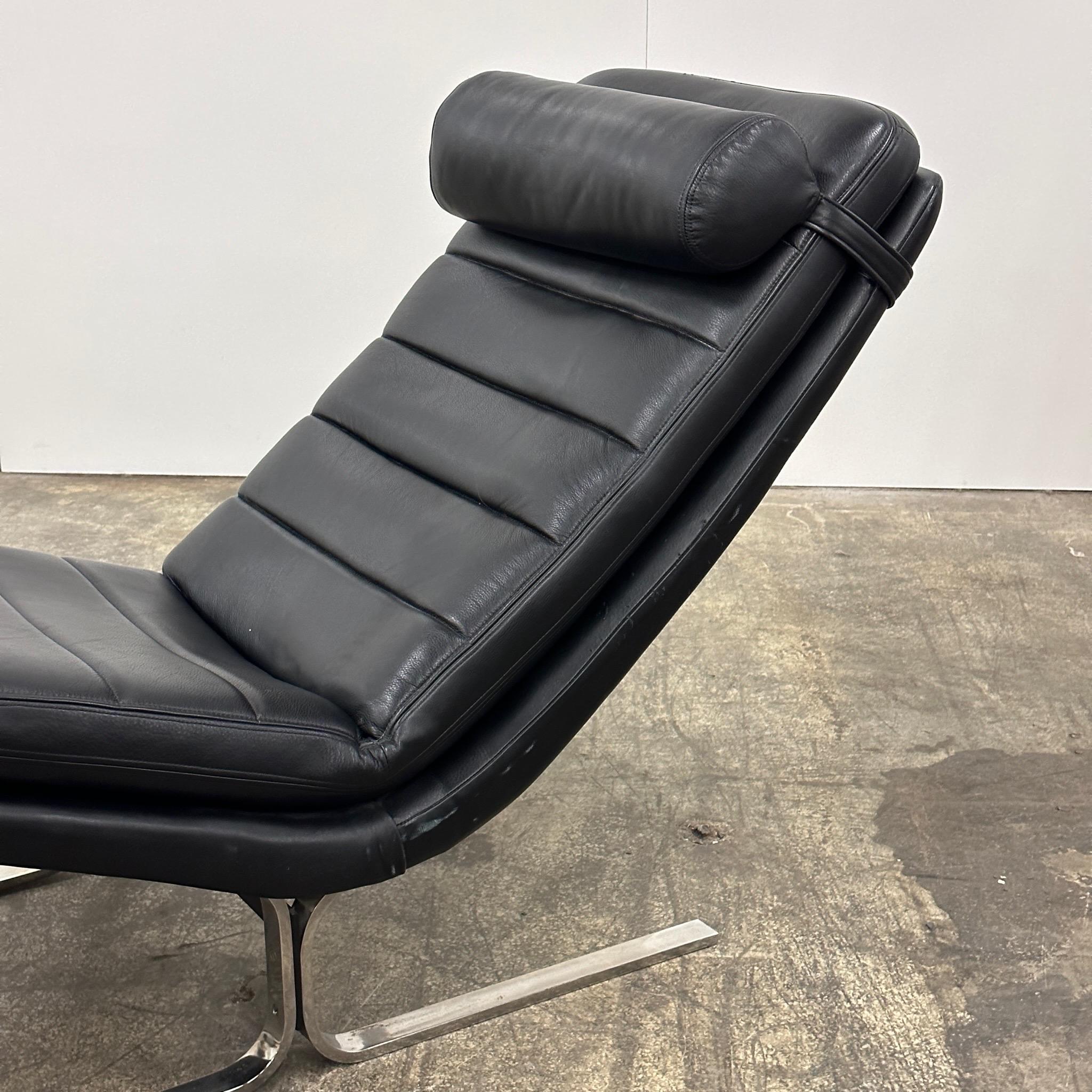 c. 1970s. Chrome legs with leather upholstery. Head rest removable. Made in North Carolina. Attributed to Harvey Probber. 