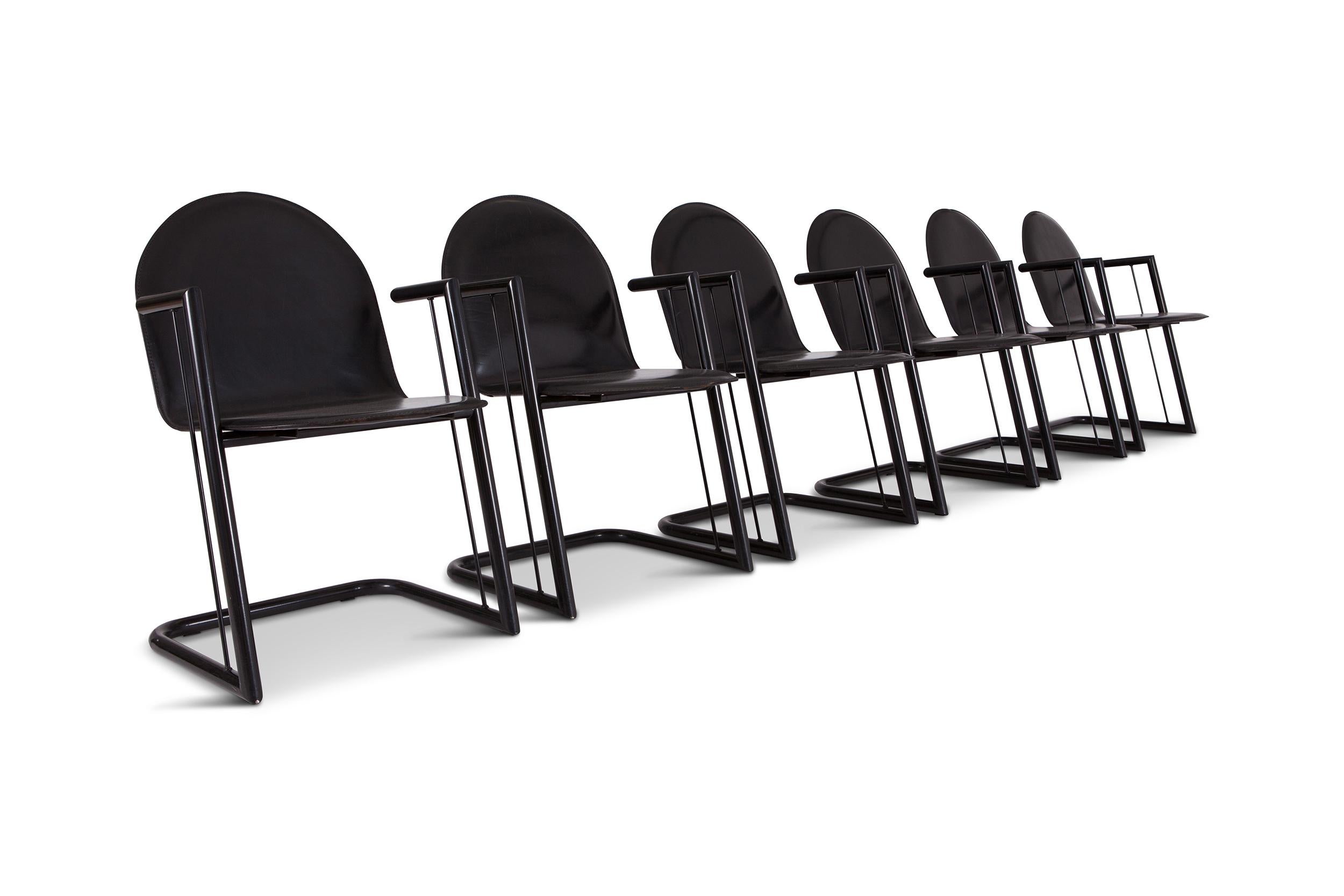 Minimal late 20th century dining chairs. 
The seat and backrest consist out of one piece and are upholstered in their original black later, and are supported by a black lacquered tubular steel frame.